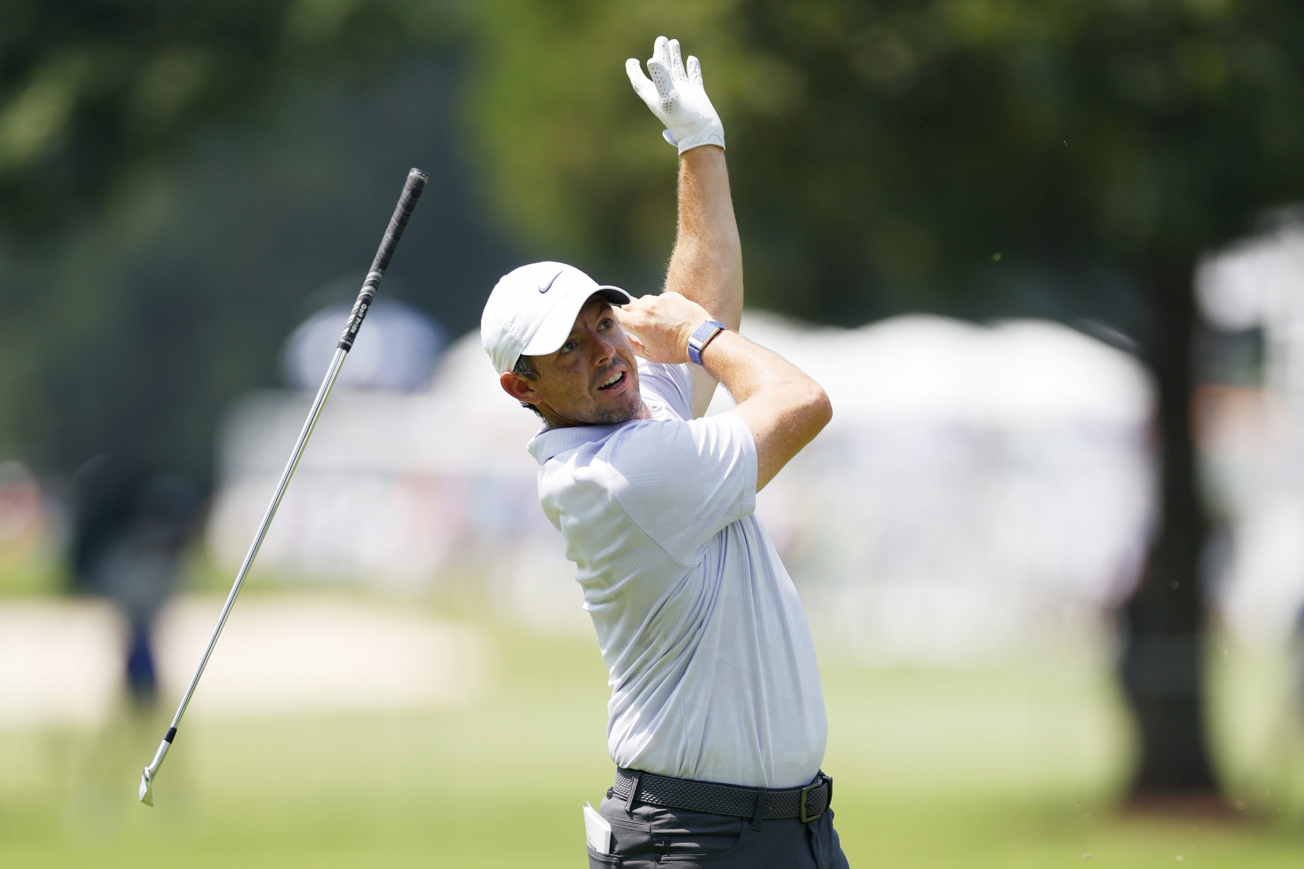 Rory McIlroy of Northern Ireland plays a shot on the fourth hole during the first round of the TOUR Championship at East Lake Golf Club on August 24, 2023 in Atlanta, Georgia. (Photo by Mike Ehrmann/Getty Images)