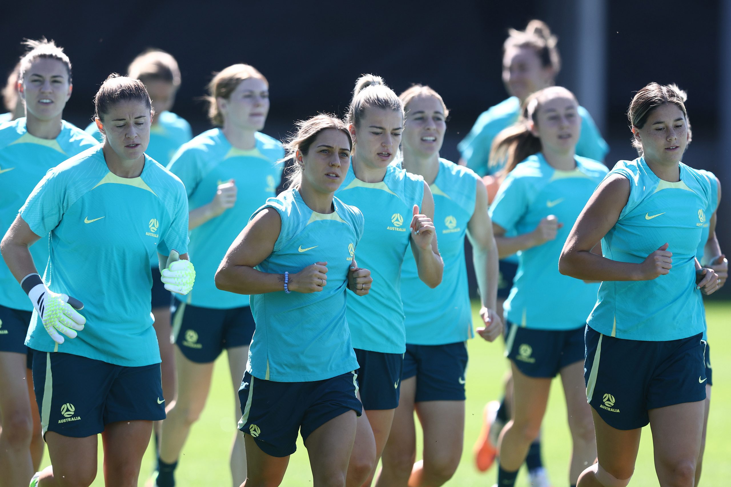 The full Matildas World Cup squad train together in Brisbane.