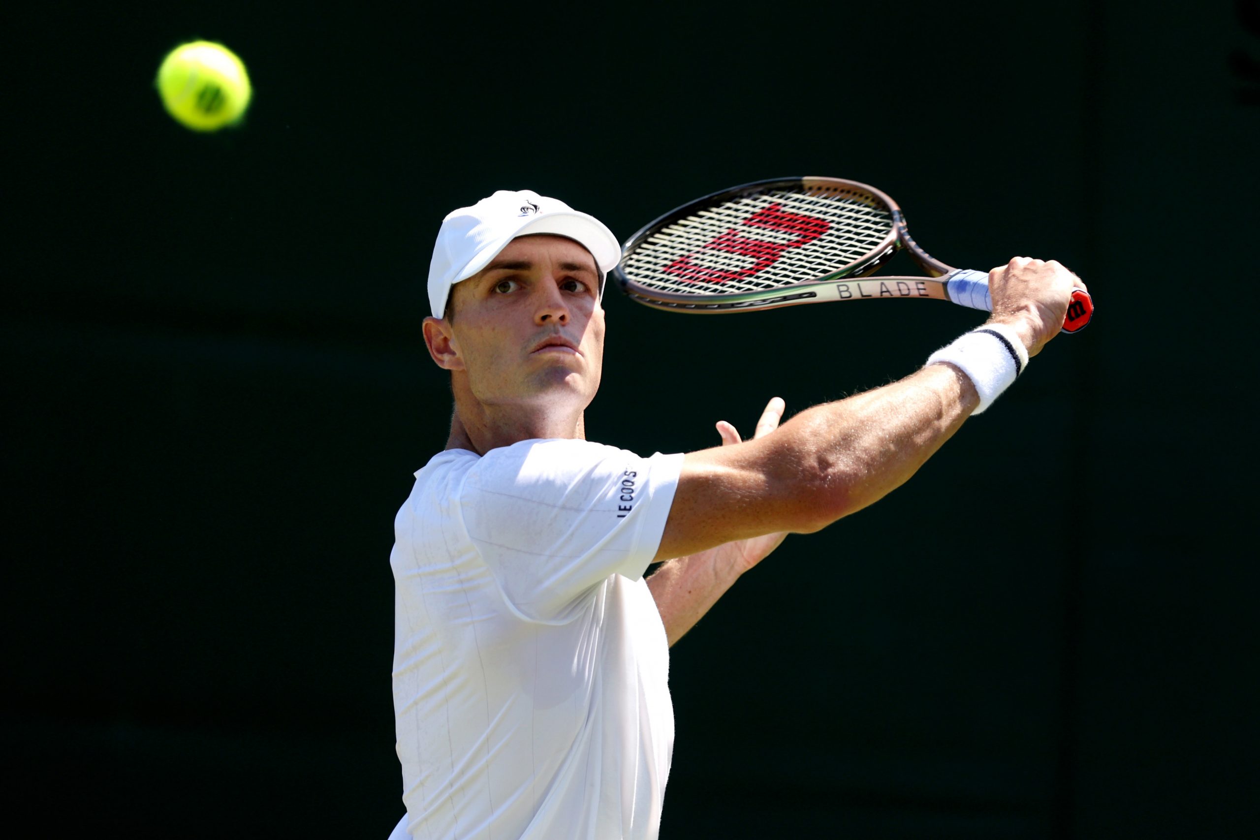 LONDON, ENGLAND - JULY 07: Christopher O'Connell of Australia plays a backhand against Jiri Vesely of Czech Republic in the Men's Singles second round match during day five of The Championships Wimbledon 2023 at All England Lawn Tennis and Croquet Club on July 07, 2023 in London, England. (Photo by Clive Brunskill/Getty Images)