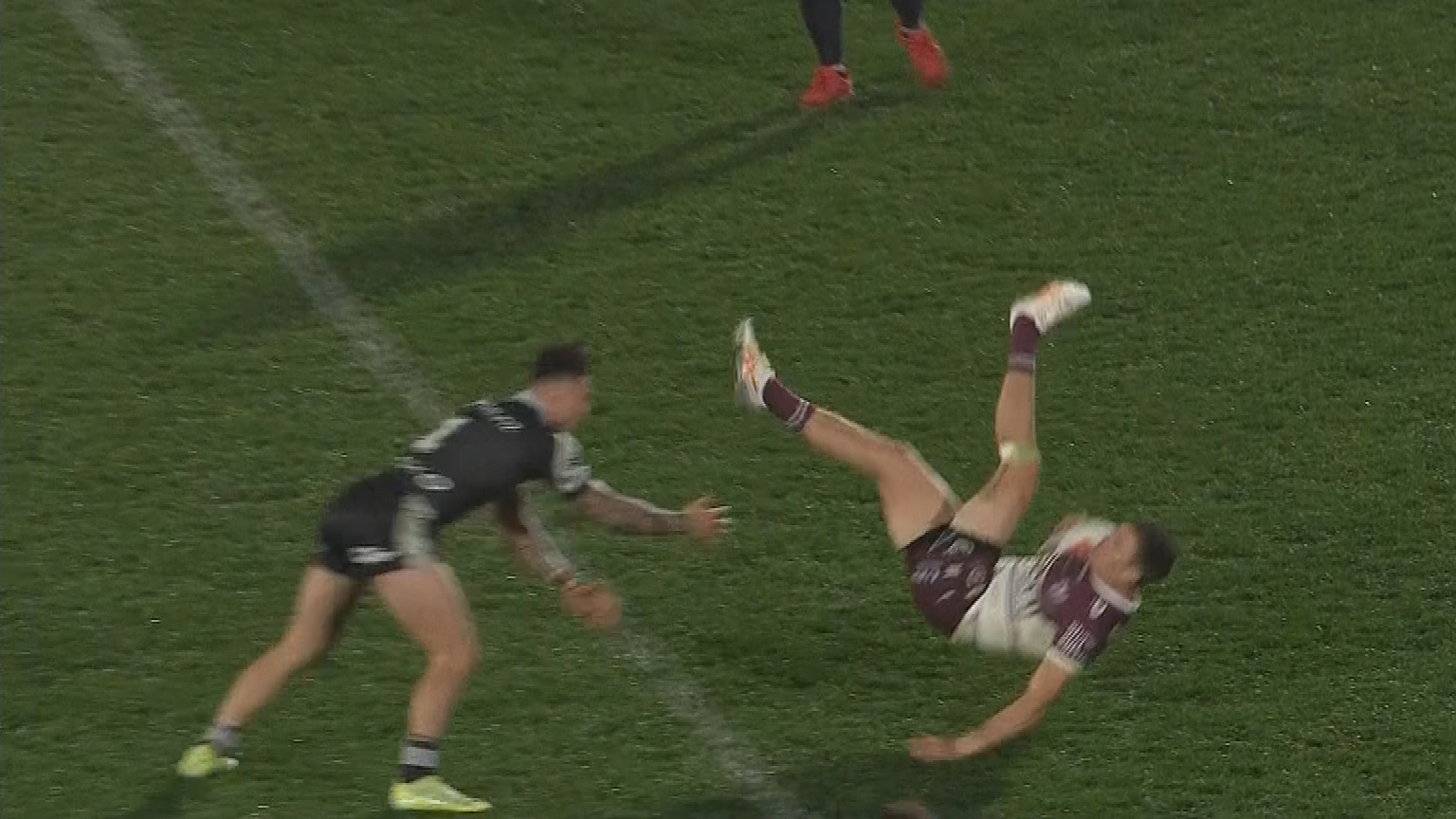 Garrick smashed by legal mid-air tackle