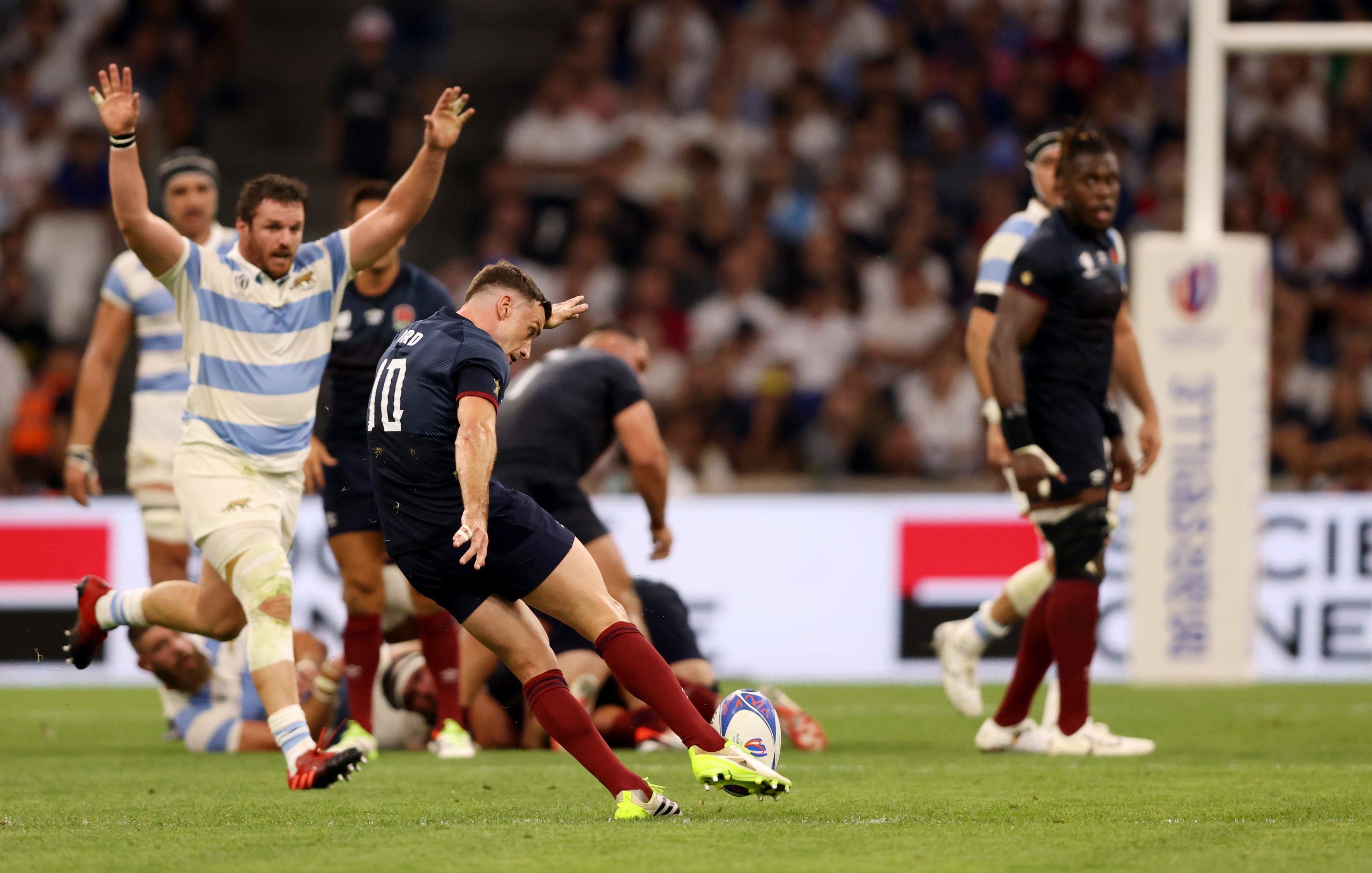 George Ford of England kicks a drop goal.