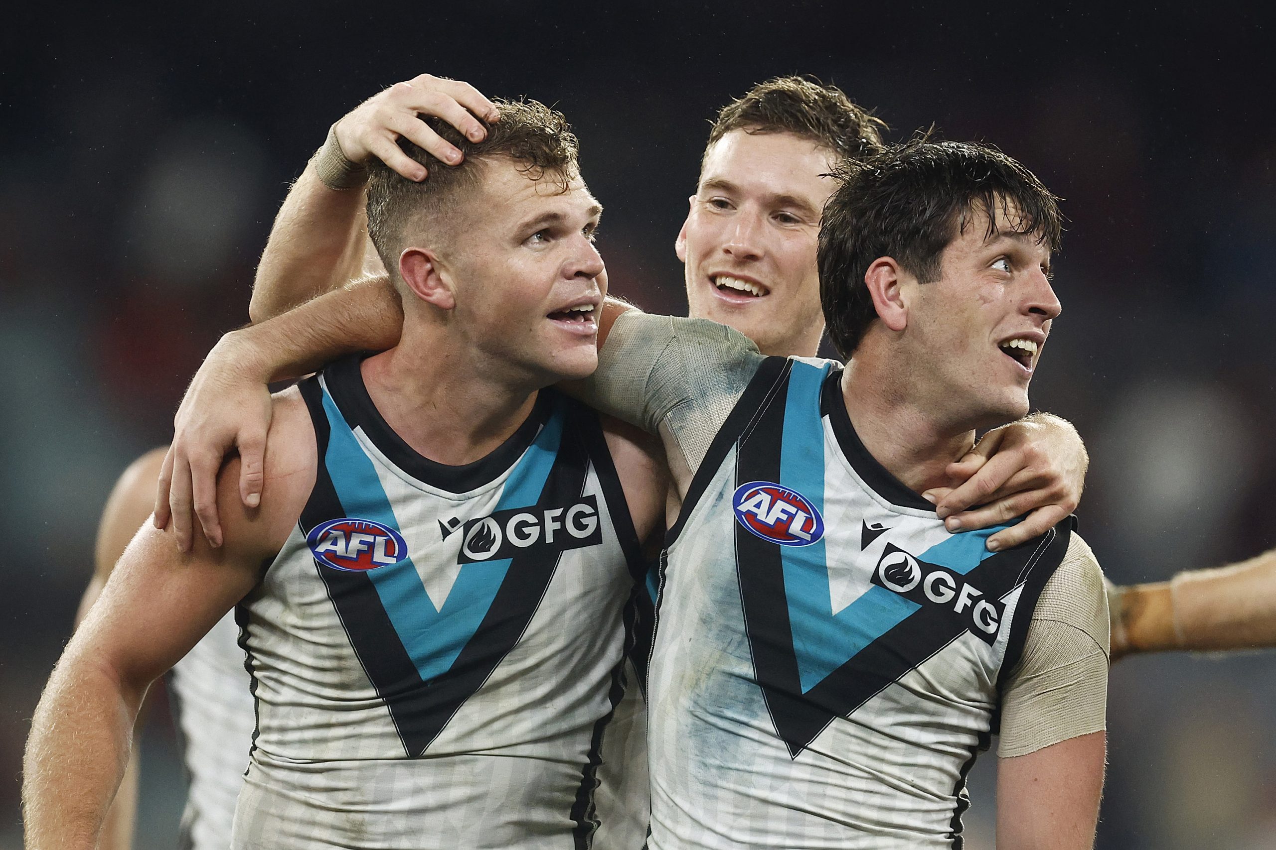 MELBOURNE, AUSTRALIA - JULY 01: Dan Houston of the Power celebrates with Zak Butters of the Power after kicking the winning goal after the final siren during the round 16 AFL match between Essendon Bombers and Port Adelaide Power at Melbourne Cricket Ground, on July 01, 2023, in Melbourne, Australia. (Photo by Daniel Pockett/Getty Images)
