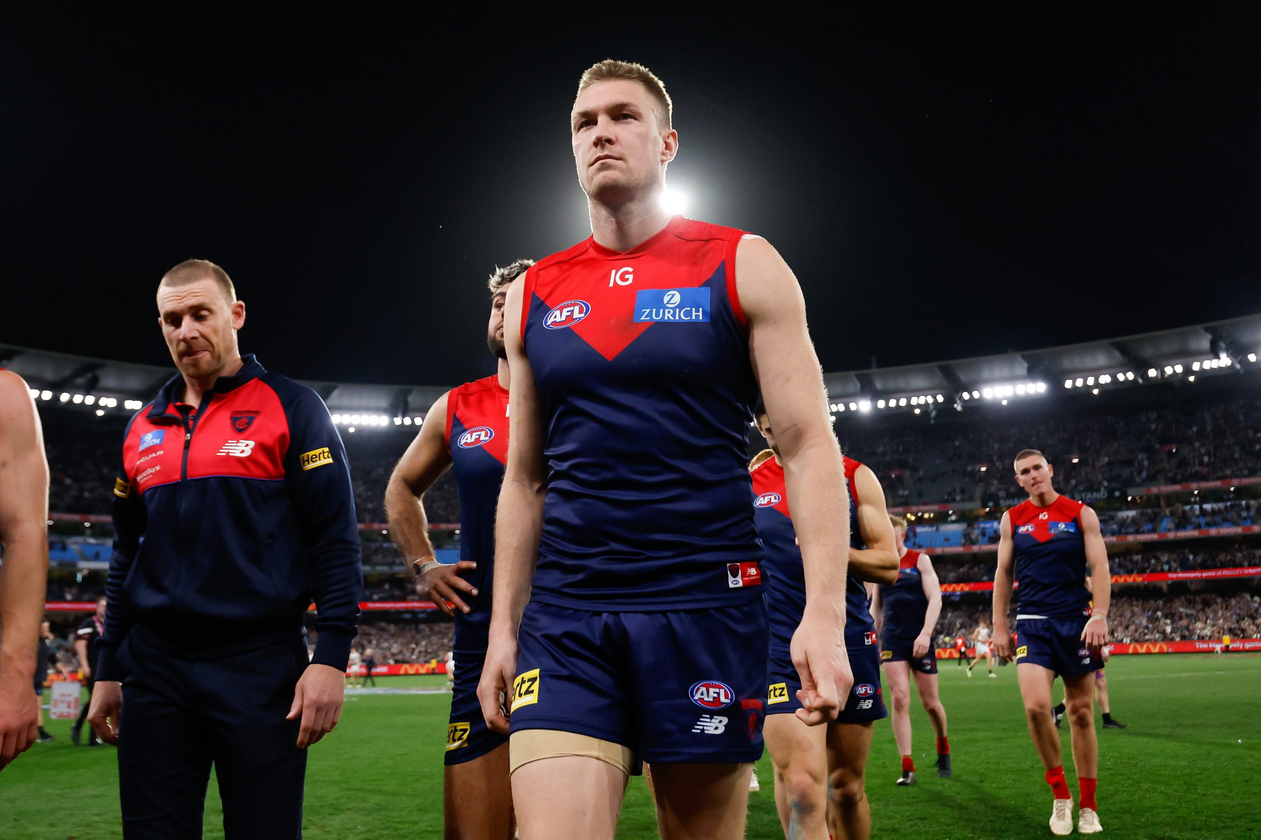 MELBOURNE, AUSTRALIA - SEPTEMBER 15: Tom McDonald of the Demons looks dejected after a loss during the 2023 AFL First Semi Final match between the Melbourne Demons and the Carlton Blues at Melbourne Cricket Ground on September 15, 2023 in Melbourne, Australia. (Photo by Dylan Burns/AFL Photos via Getty Images)