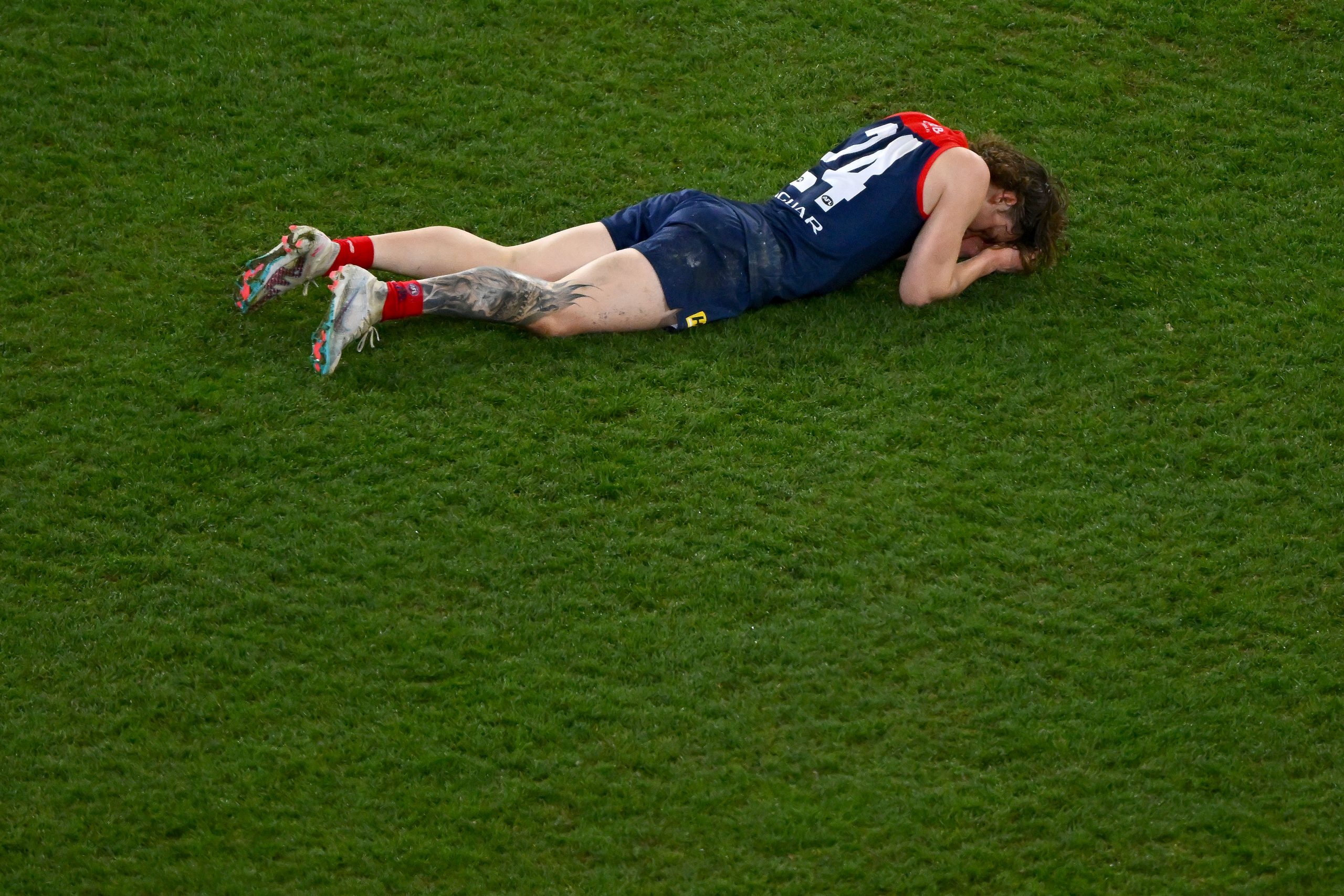 MELBOURNE, AUSTRALIA - SEPTEMBER 15: Trent Rivers of the Demons reacts on the final siren during the 2023 AFL First Semi Final match between the Melbourne Demons and the Carlton Blues at Melbourne Cricket Ground on September 15, 2023 in Melbourne, Australia. (Photo by Morgan Hancock/AFL Photos via Getty Images)