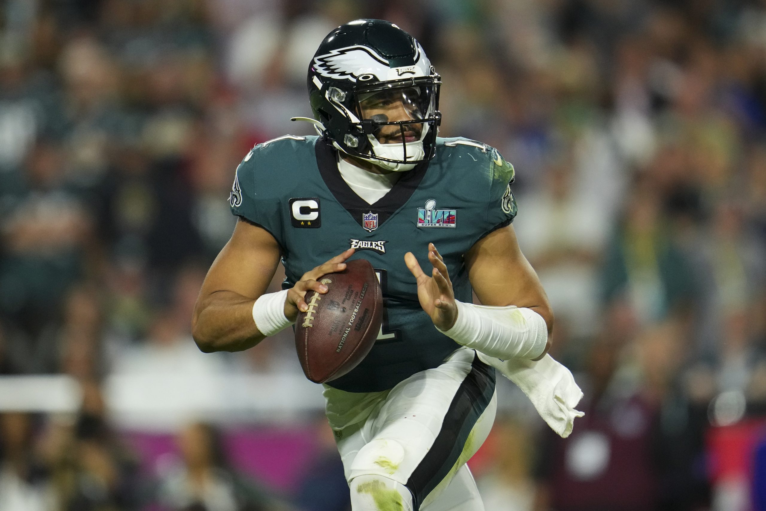 GLENDALE, AZ - FEBRUARY 12: Jalen Hurts #1 of the Philadelphia Eagles runs the ball against the Kansas City Chiefs during the fourth quarter in Super Bowl LVII at State Farm Stadium on February 12, 2023 in Glendale, Arizona. (Photo by Cooper Neill/Getty Images)