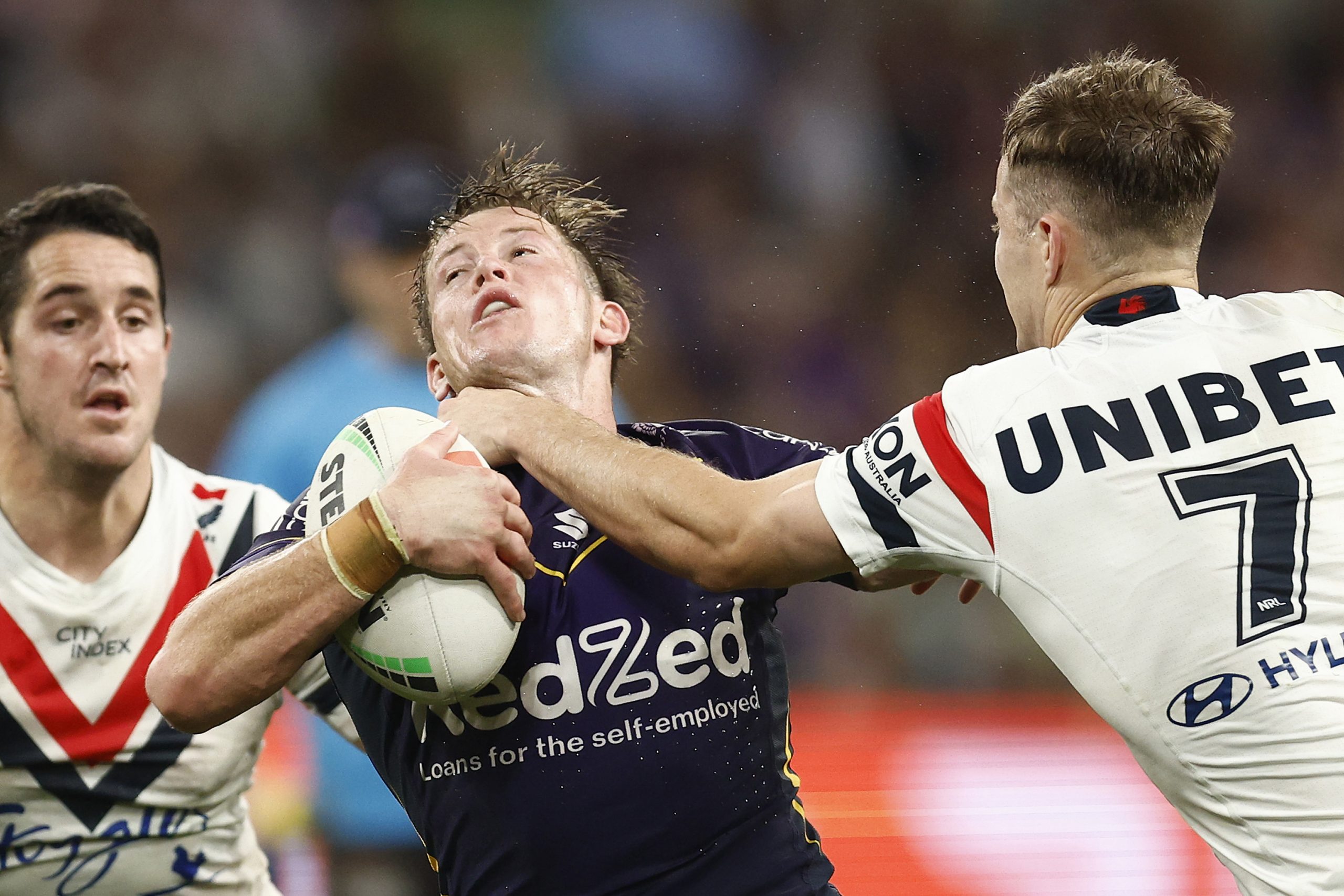 Harry Grant of the Storm is tackled by Sam Walker of the Roosters during the NRL Semi Final match between Melbourne Storm and the Sydney Roosters at AAMI Park on September 15, 2023 in Melbourne, Australia. (Photo by Daniel Pockett/Getty Images)