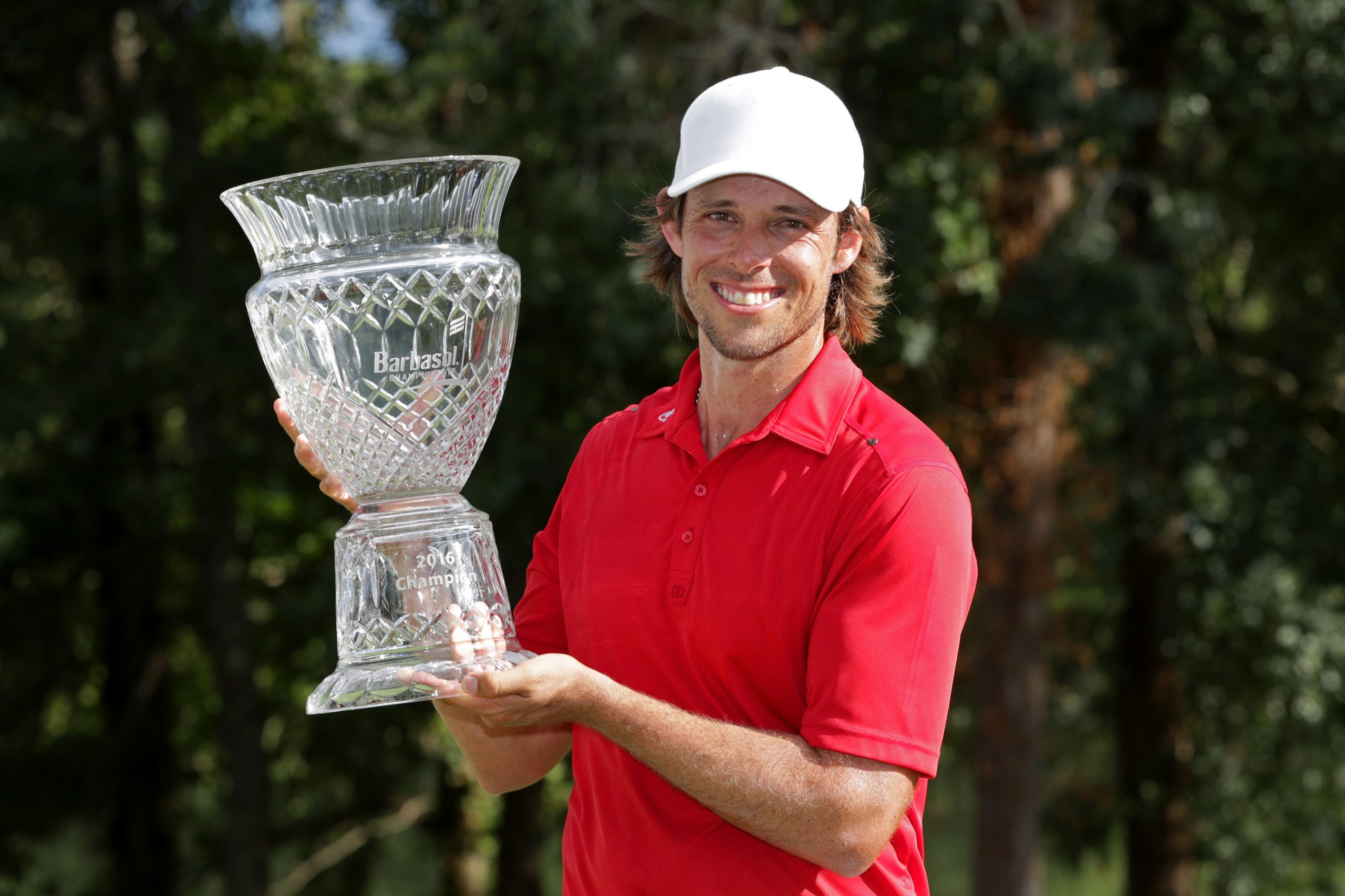 Aaron Baddeley with the winner's trophy at the Barbasol Championship at the Robert Trent Jones Golf Trail at Grand National on July 17, 2016 in Auburn, Alabama.