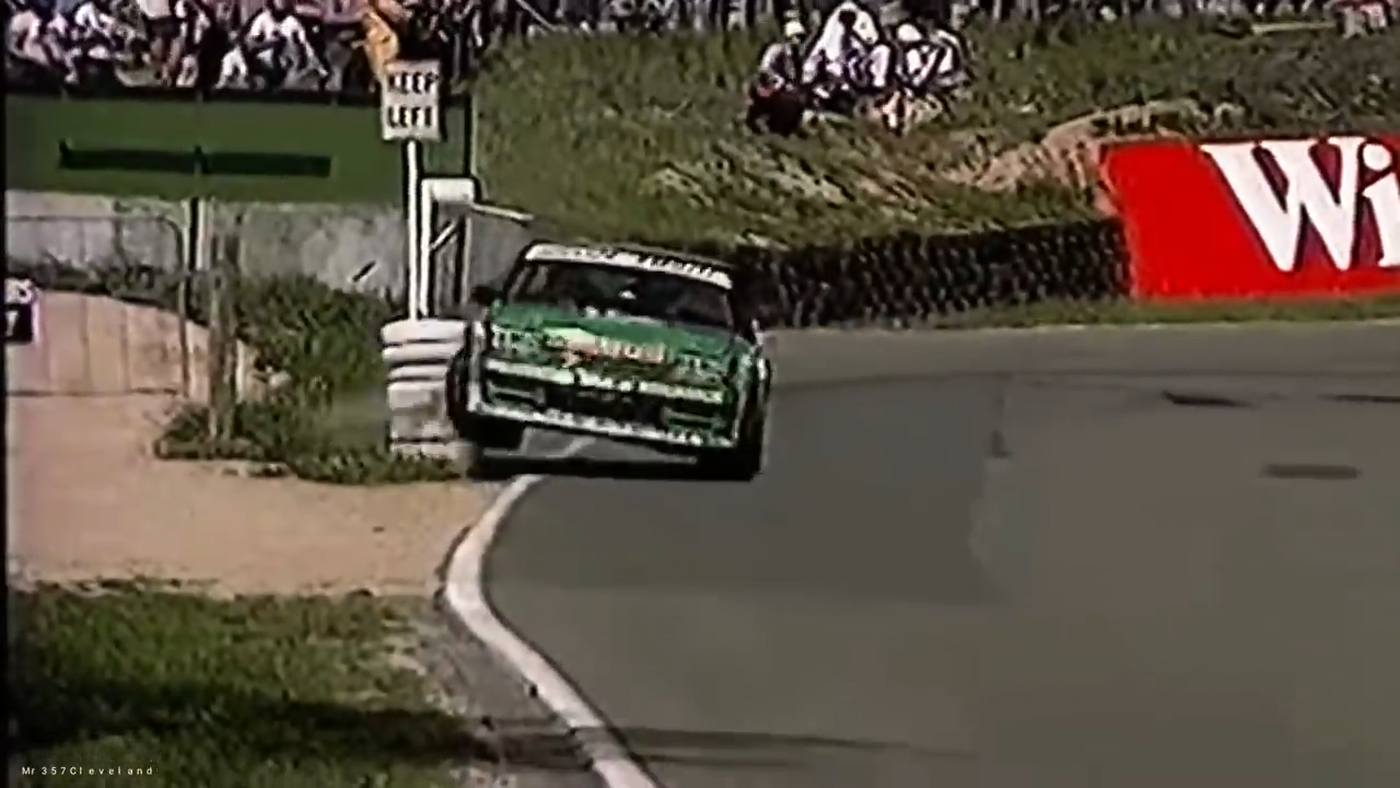 Dick Johnson broke a steering arm when he clipped the tyre bundle at the end of the concrete wall during his Hardies Heroes lap ahead of the 1983 Bathurst 1000.