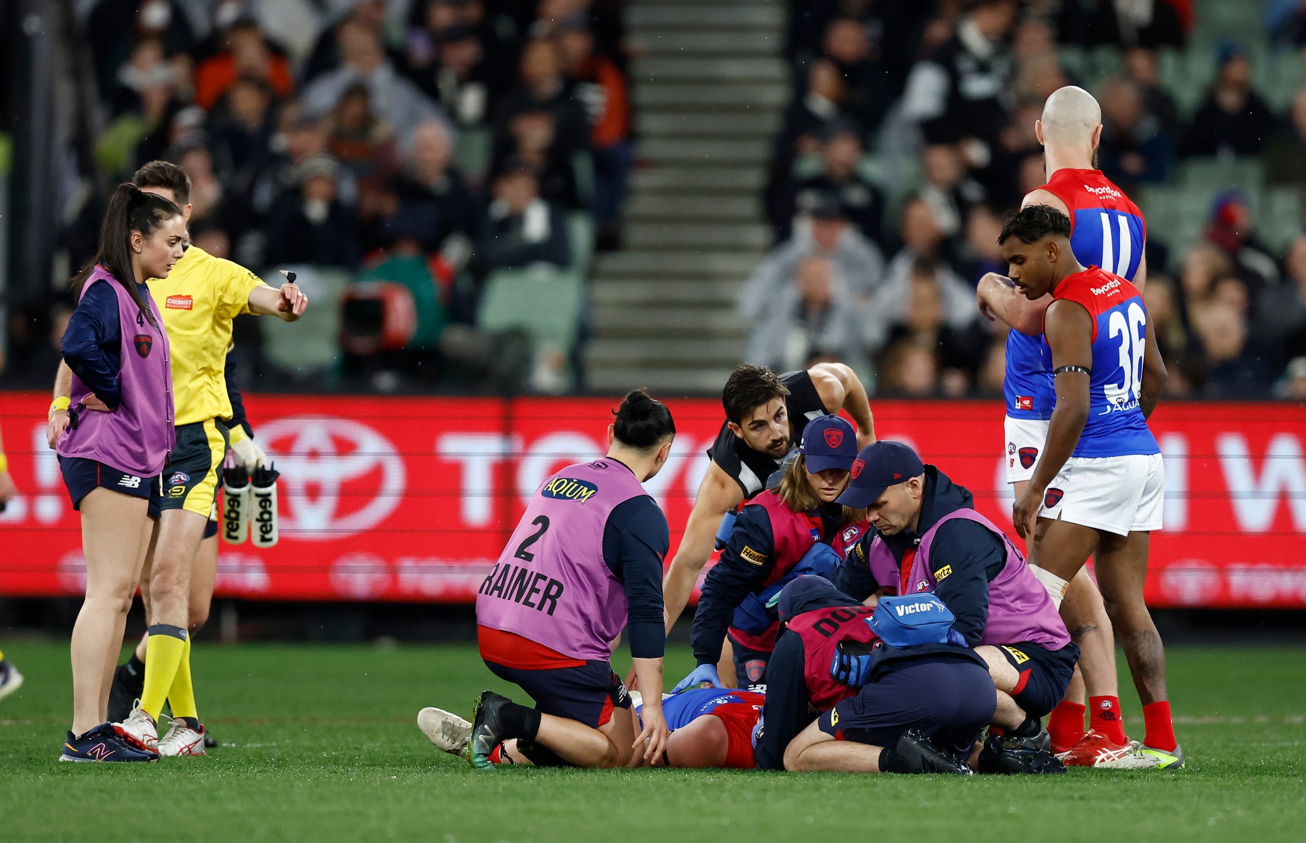 MELBOURNE, AUSTRALIA - SEPTEMBER 07: Angus Brayshaw of the Demons is seen injured during the 2023 AFL First Qualifying Final match between the Collingwood Magpies and the Melbourne Demons at Melbourne Cricket Ground on September 07, 2023 in Melbourne, Australia. (Photo by Michael Willson/AFL Photos via Getty Images)