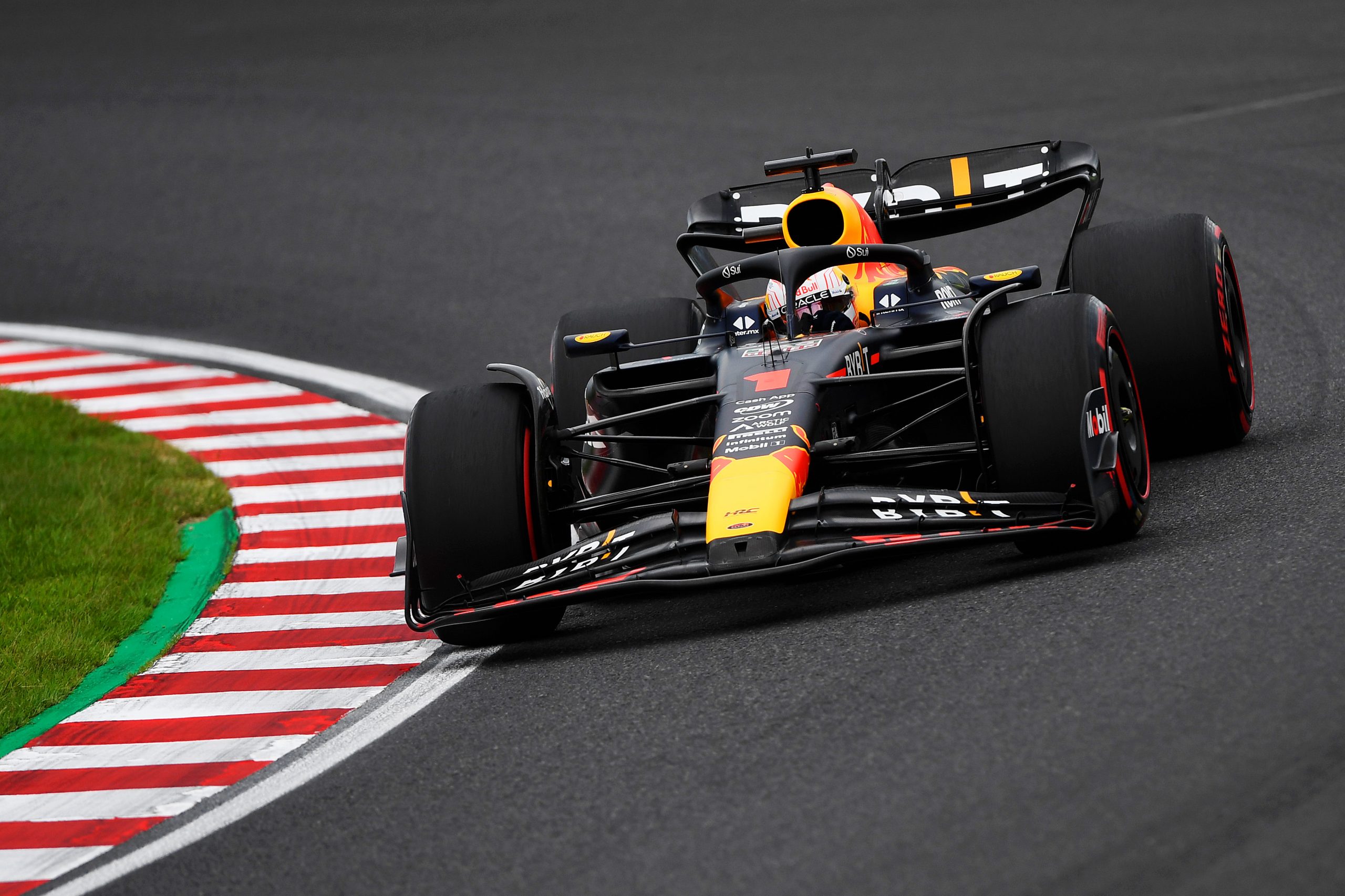 Max Verstappen driving on track during practice ahead of the Japanese Grand Prix.