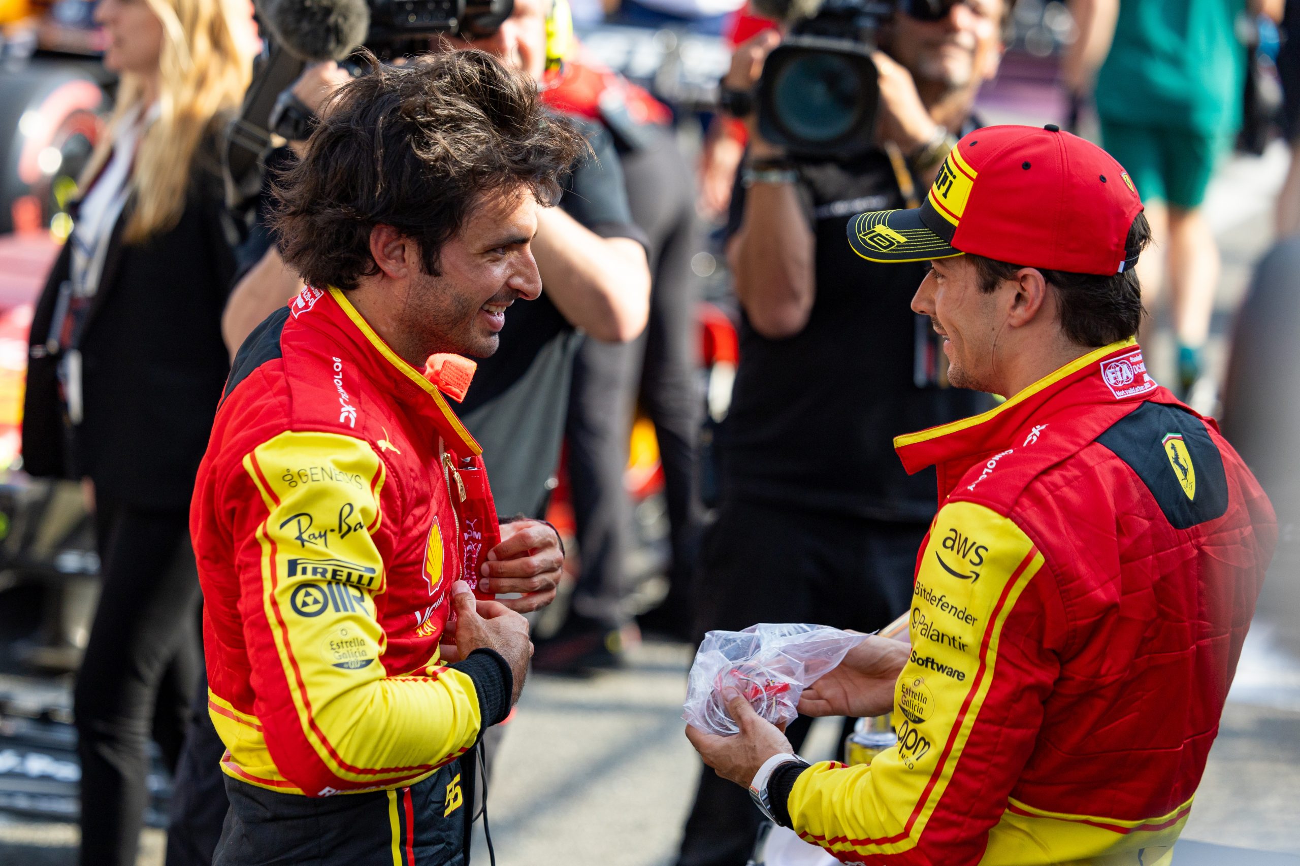 Ferrari drivers Carlos Sainz of Spain and Charles Leclerc of Monaco talk after qualifying ahead of the F1 Grand Prix of Italy at Autodromo Nazionale Monza on September 2, 2023 in Monza, Italy. (Photo by Kym Illman/Getty Images)