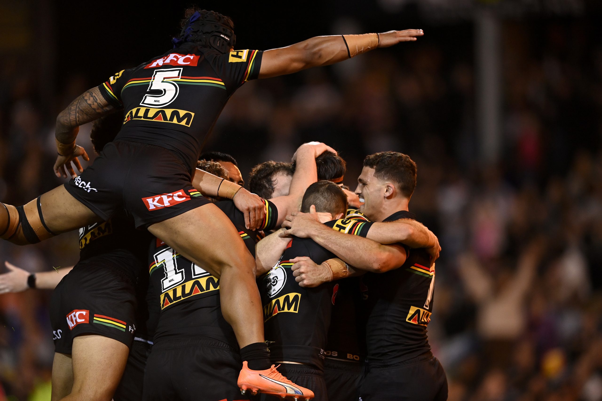 The Panthers celebrating the Luke Sommerton try against the Cowboys.