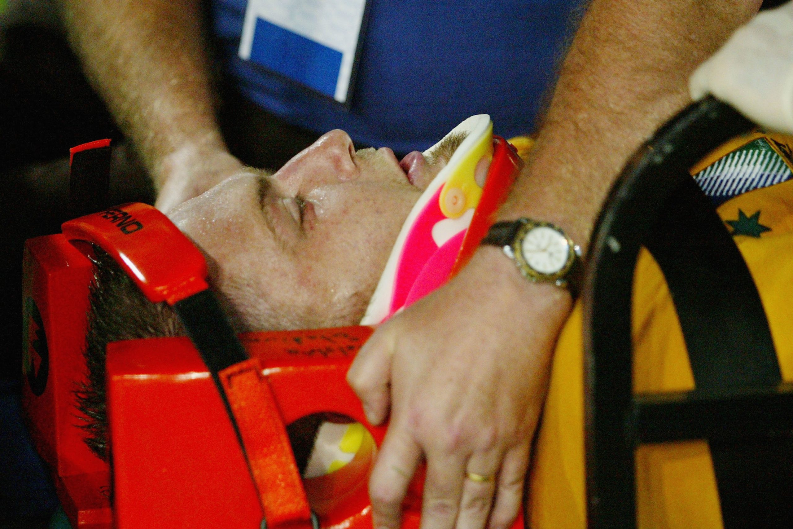 Ben Darwin of Australia is stretchered off the field in 2003.