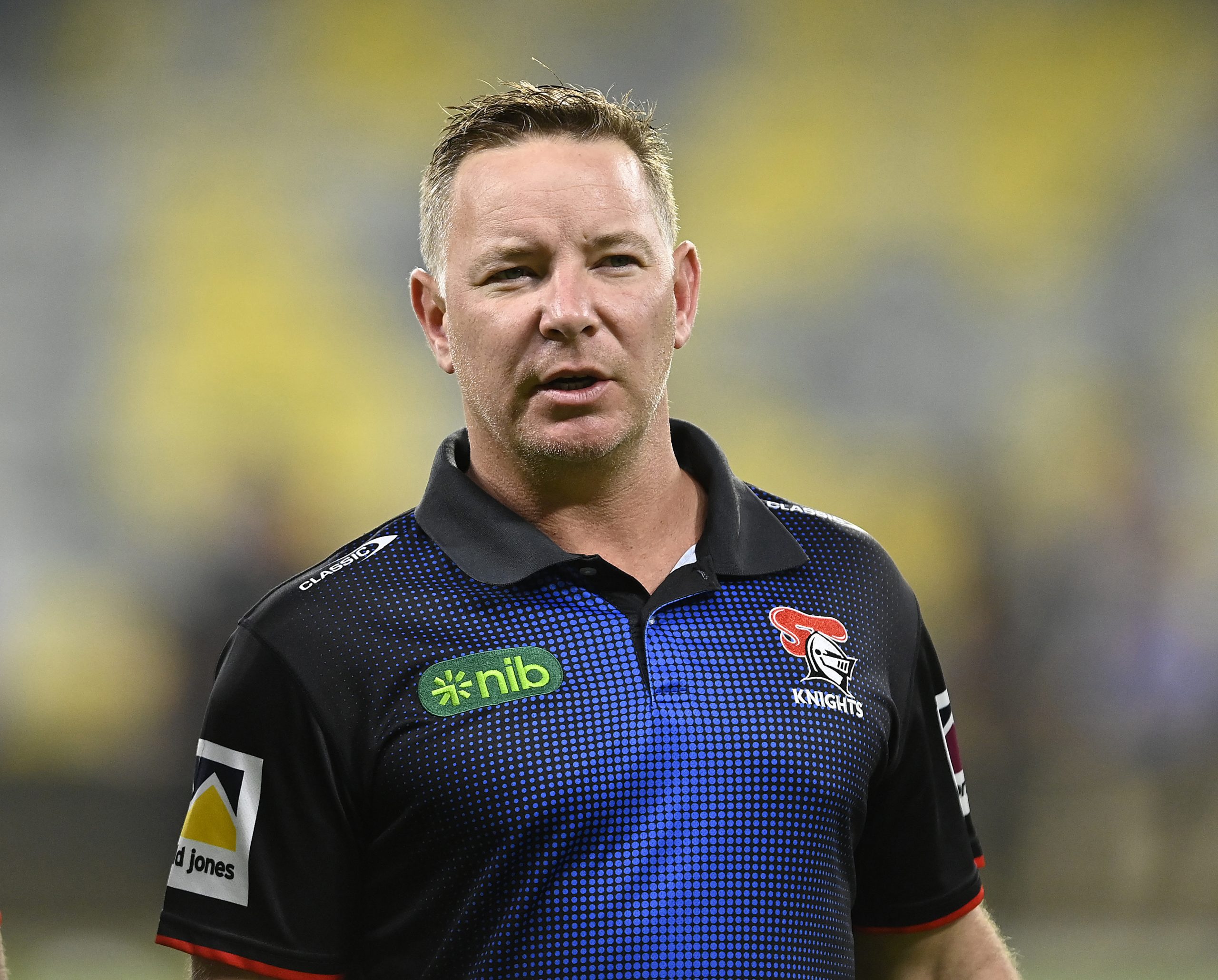 TOWNSVILLE, AUSTRALIA - APRIL 22: Newcastle coach Adam O'Brien looks on before the start of the round eight NRL match between North Queensland Cowboys and Newcastle Knights at Qld Country Bank Stadium on April 22, 2023 in Townsville, Australia. (Photo by Ian Hitchcock/Getty Images)