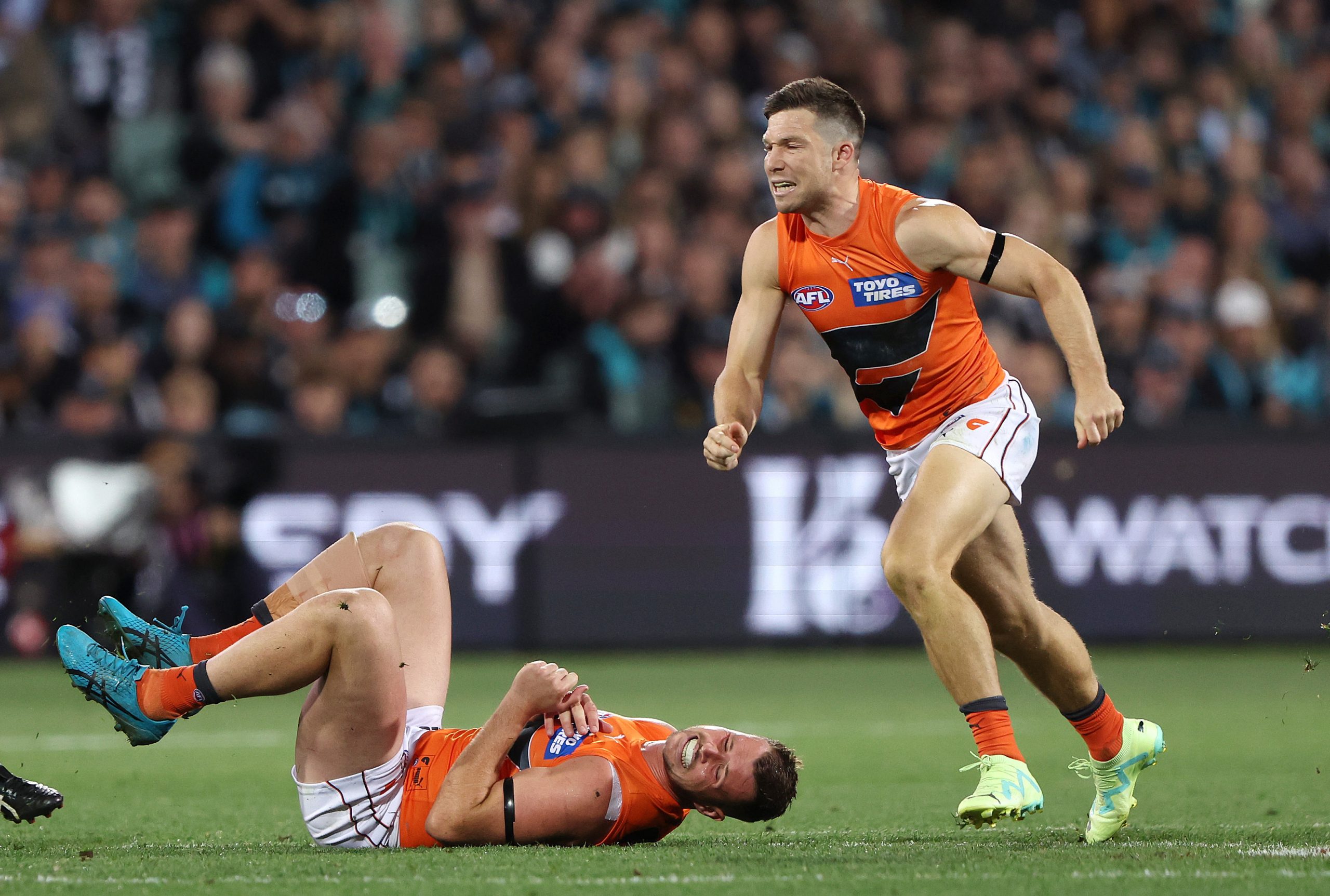 Kieren Briggs goes down with a shoulder injury.