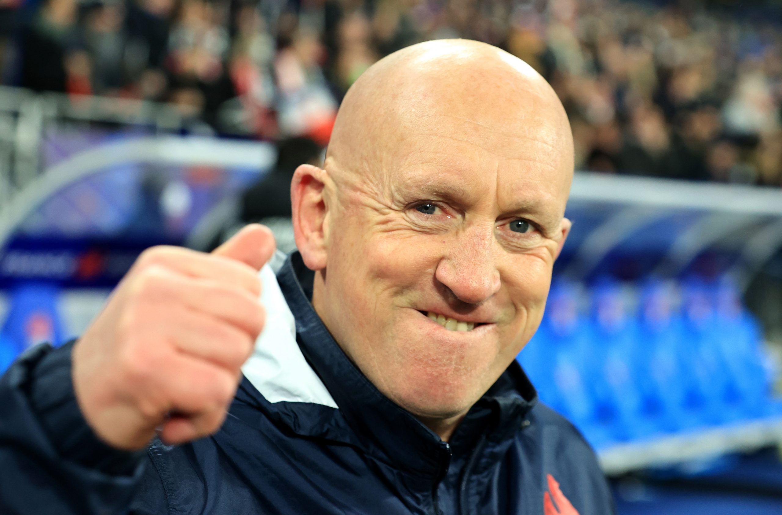 France defence coach Shaun Edwards celebrates victory over England.