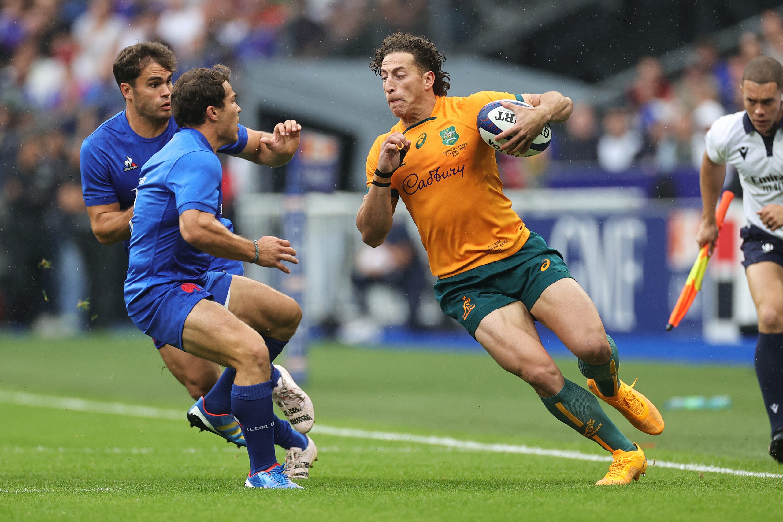 Mark Nawaqanitawase takes on Antoine Dupont in their Rugby World Cup warm-up.