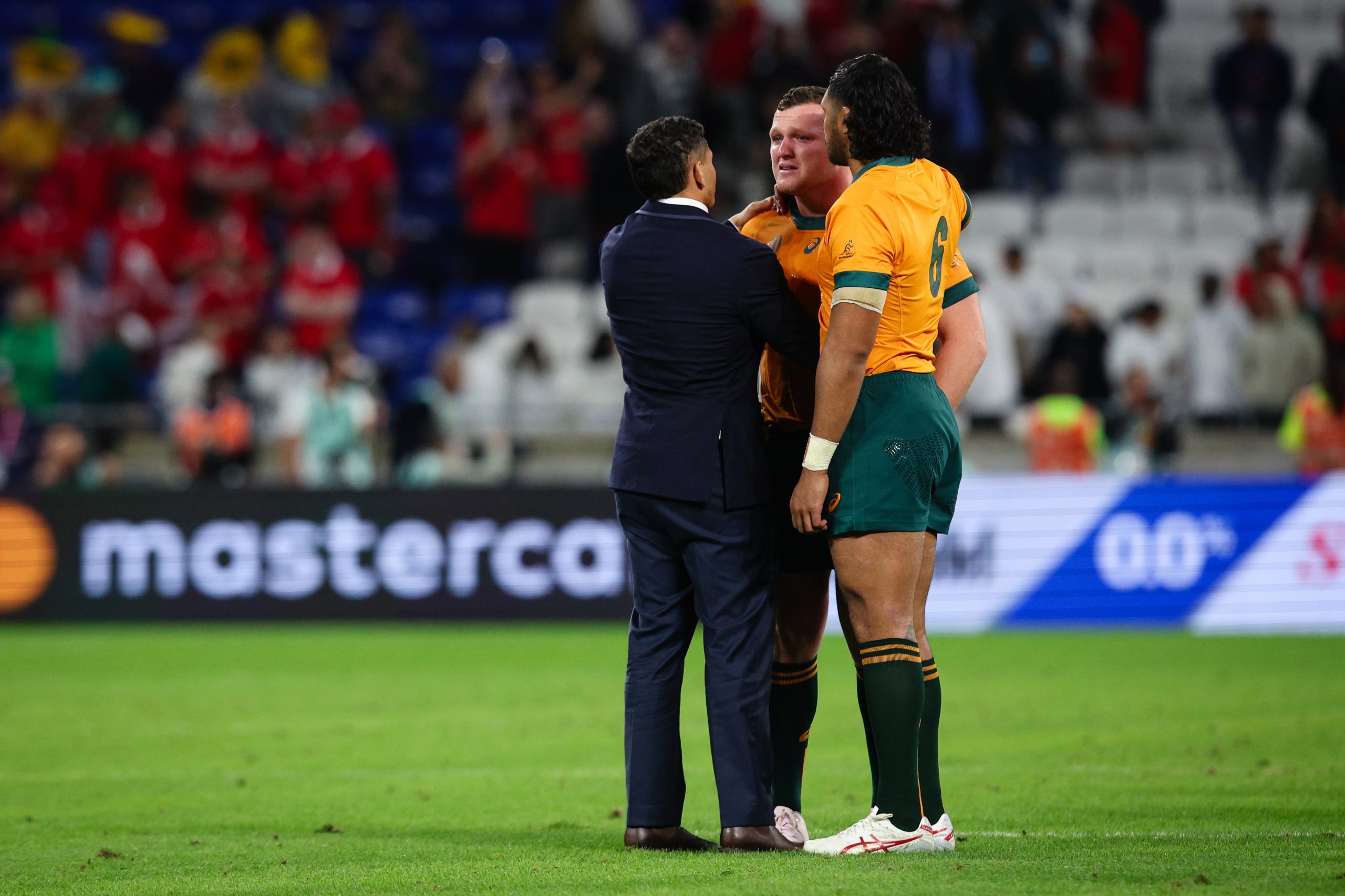 Angus Bell of Australia is dejected in Lyon.