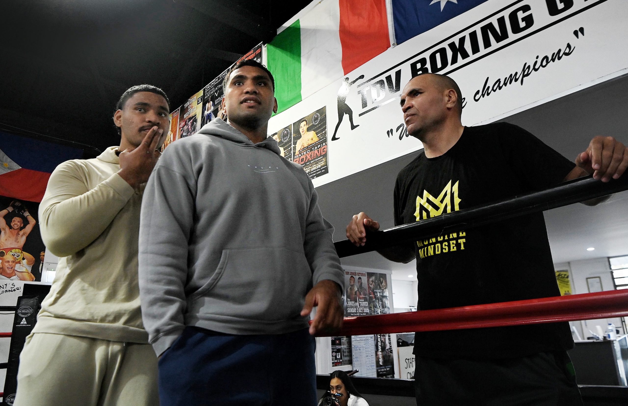 Tevita Pangai (centre) with his brother Jermaine Pangai  (left) and Anthony Mundine (right) at the Bondi Boxing Club.