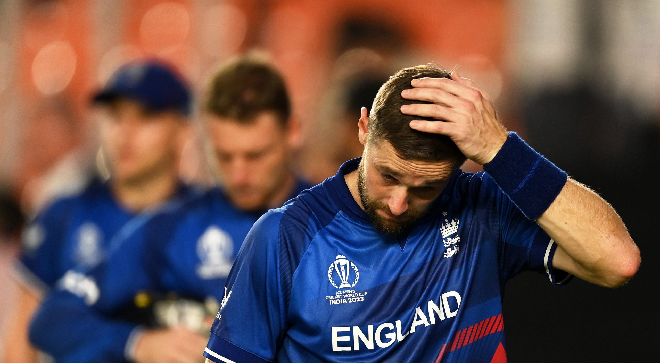 Chris Woakes of England cuts a dejected figure.
