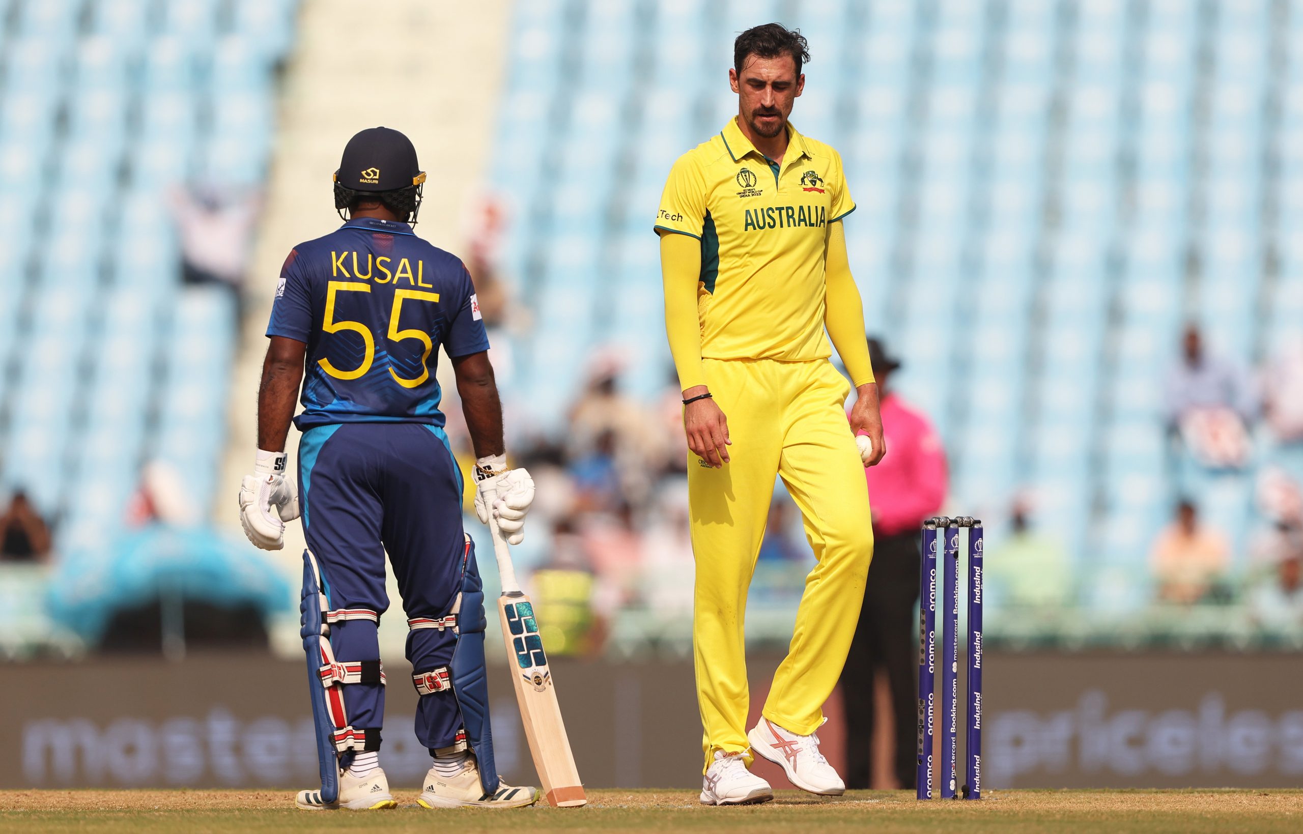 Mitchell Starc of Australia reacts towards Kusal Perera of Sri Lanka.