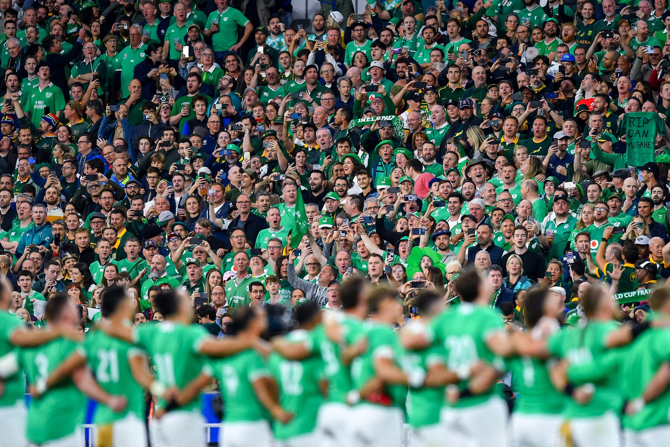 Ireland fans sing the national anthem along with the players at the Rugby World Cup.