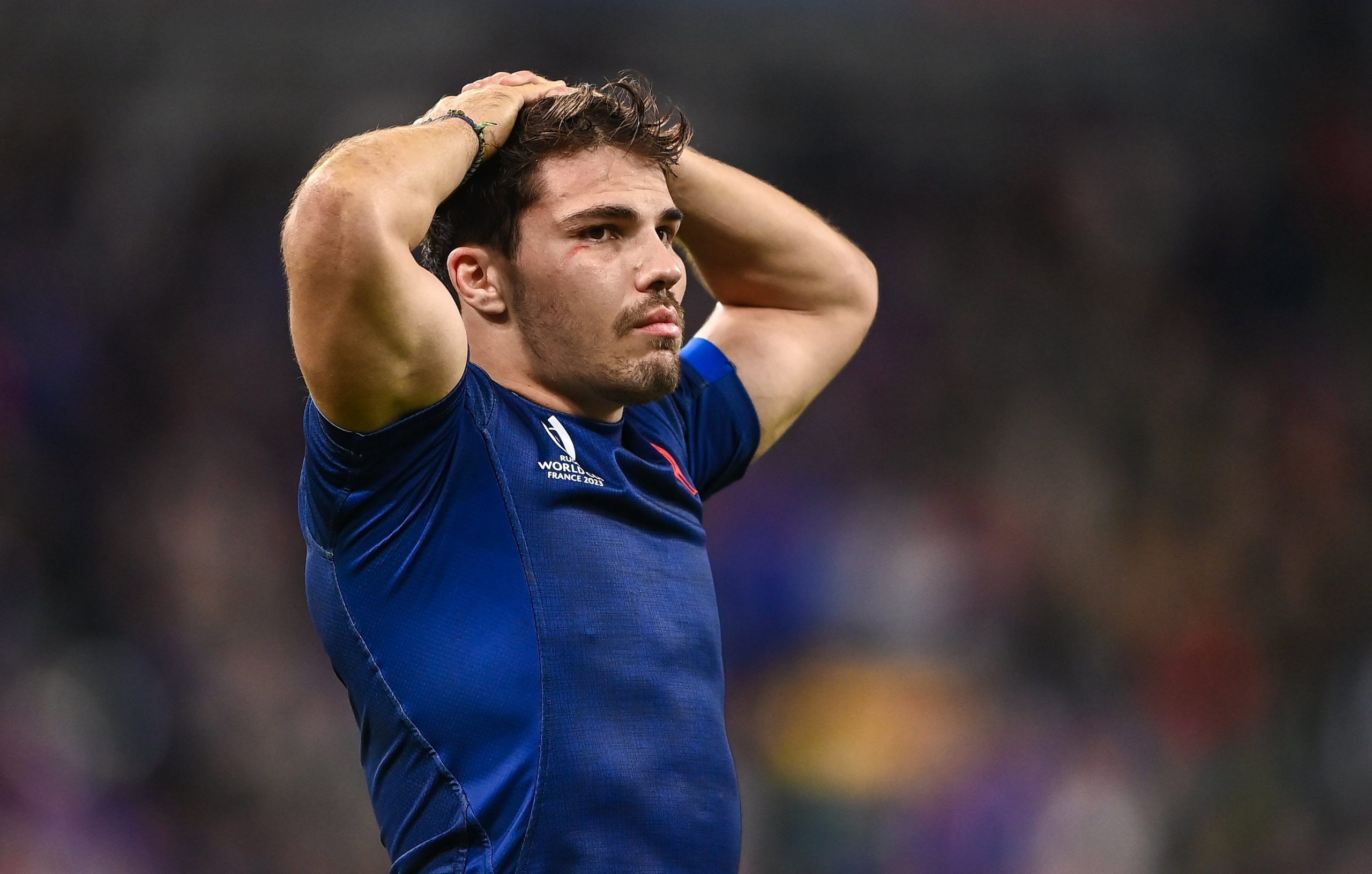 Antoine Dupont of France reacts after his side's defeat.