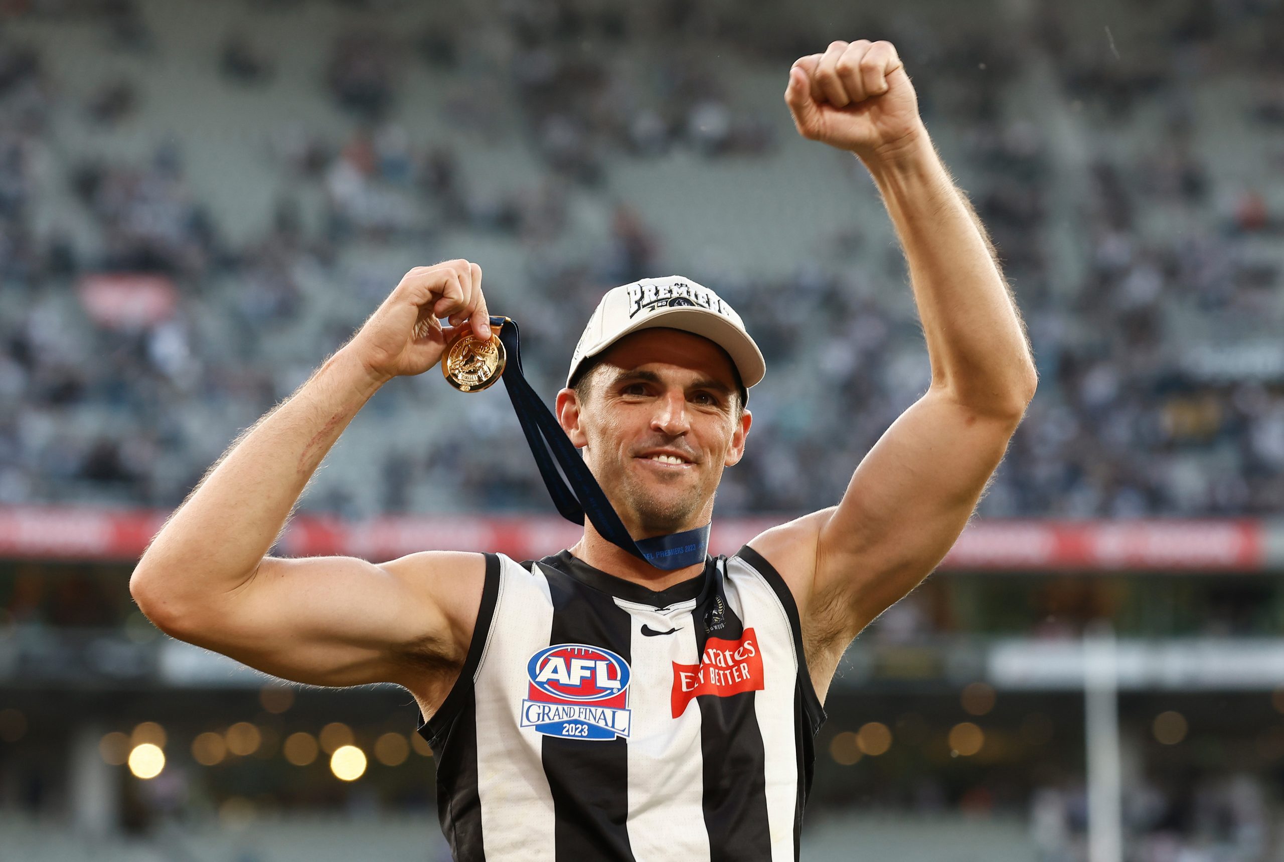 Scott Pendlebury celebrates his second premiership medal.