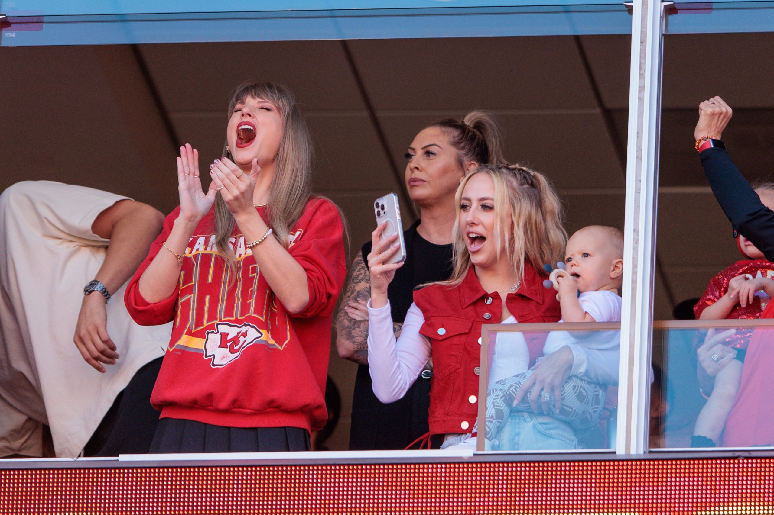 KANSAS CITY, MO - OCTOBER 22: Grammy award winning artist Taylor Swift watches the game between the Kansas City Chiefs and the Los Angeles Chargers with Brittany Mahomes on October 22, 2023 at GEHA Field at Arrowhead Stadium in Kansas City, Missouri. (Photo by William Purnell/Icon Sportswire via Getty Images)