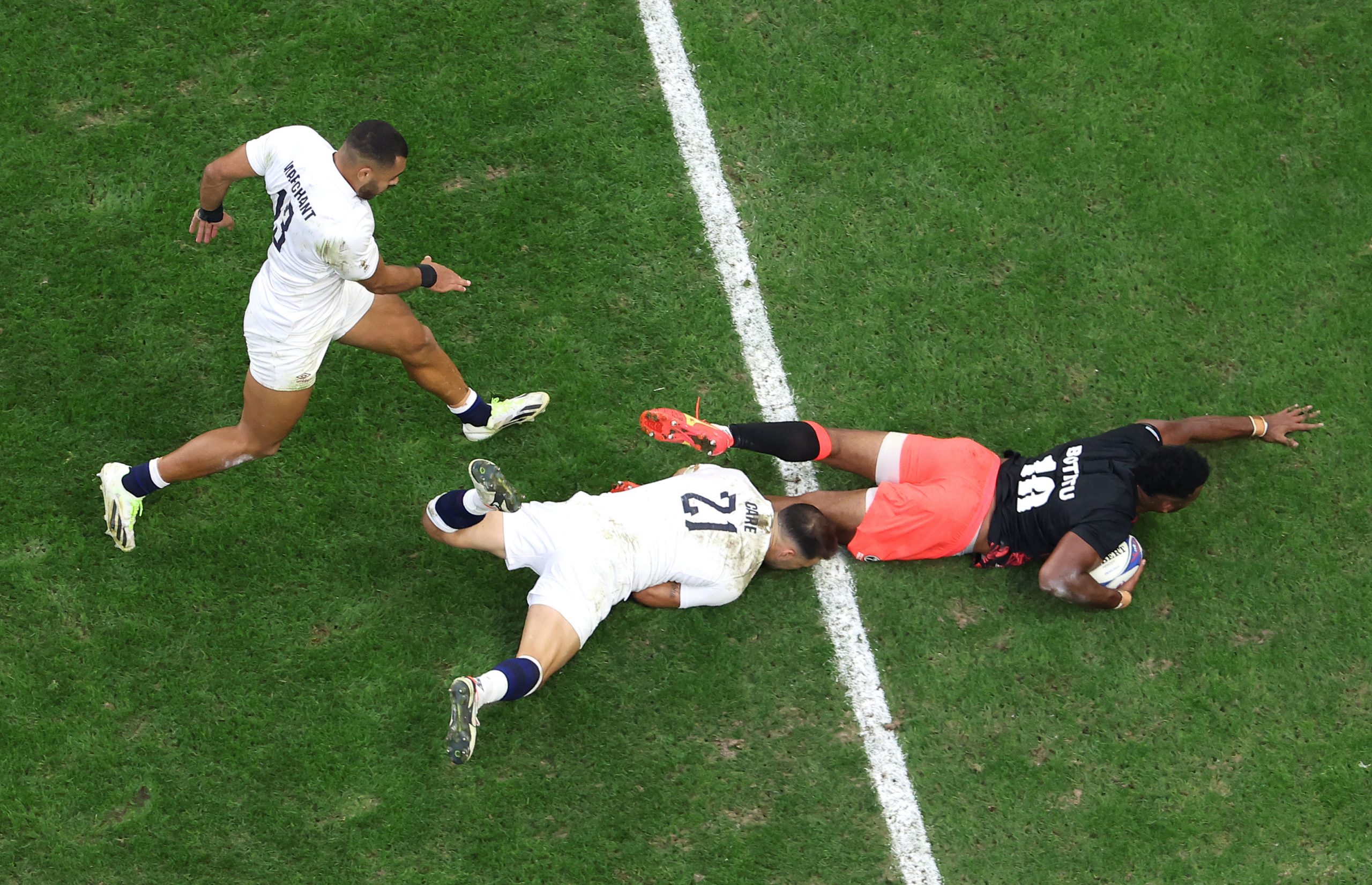 Vilimoni Botitu of Fiji scores his team's third try during the Rugby World Cup.