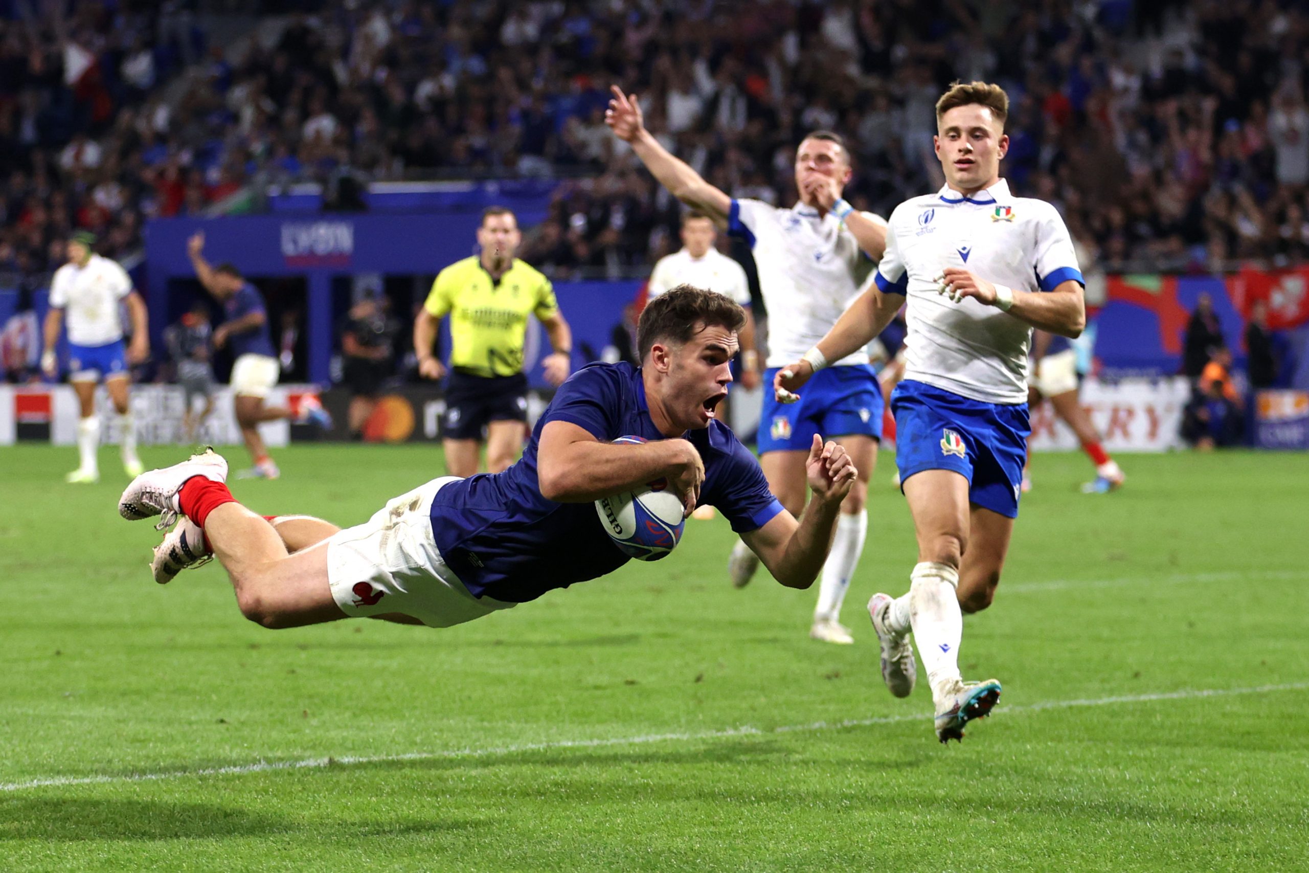 Damian Penaud of France scores his team's fourth try.