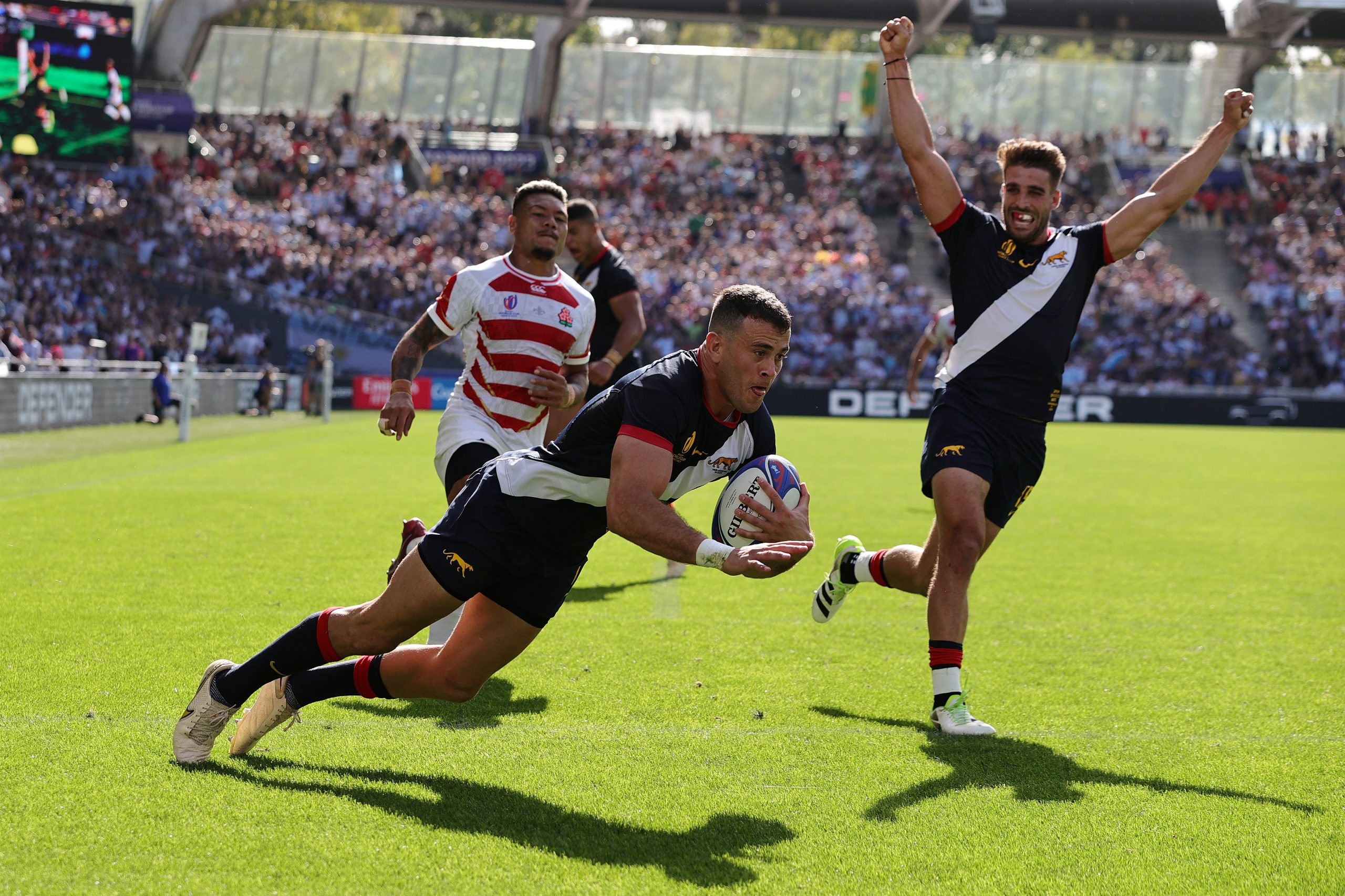 Emiliano Boffelli of Argentina scores his team's fourth try.
