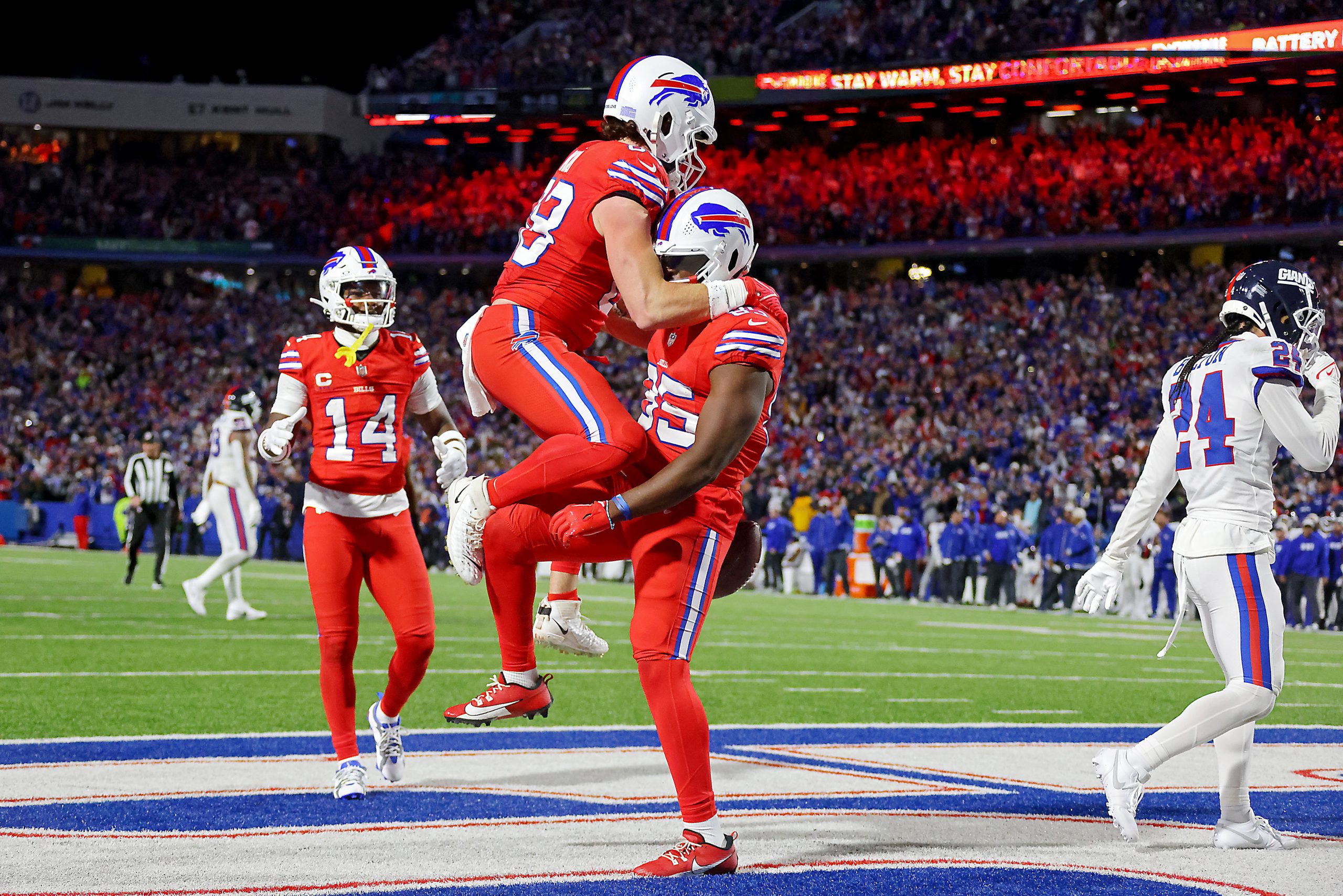 Quintin Morris of Buffalo celebrates with Dawson Knox after catching a touchdown pass.