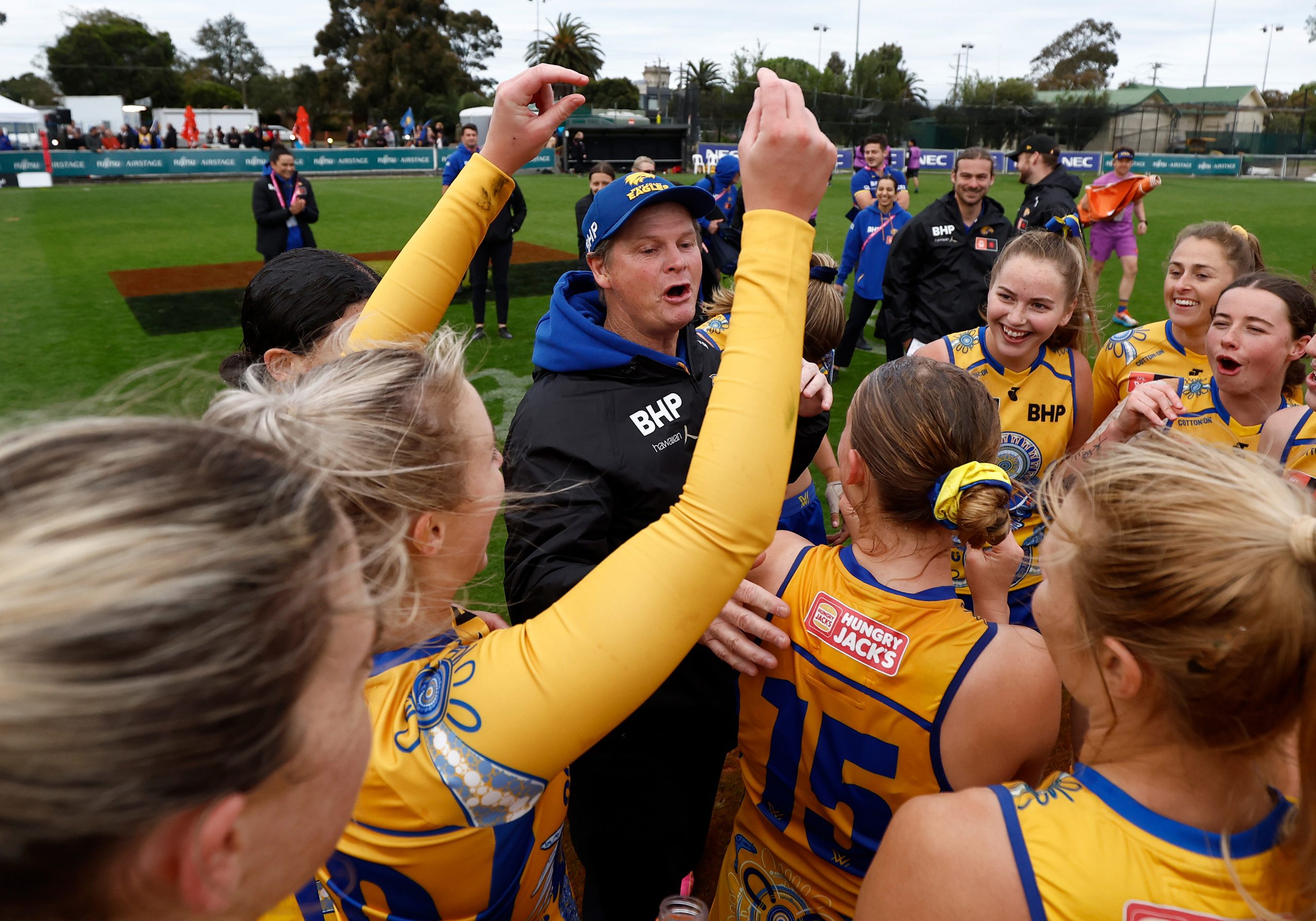 MELBOURNE, AUSTRALIA - OCTOBER 22: Michael Prior, Senior Coach of the Eagles celebrates with his players during the 2023 AFLW Round 08 match between The Essendon Bombers and The West Coast Eagles at Windy Hill on October 22, 2023 in Melbourne, Australia. (Photo by Michael Willson/AFL Photos via Getty Images)