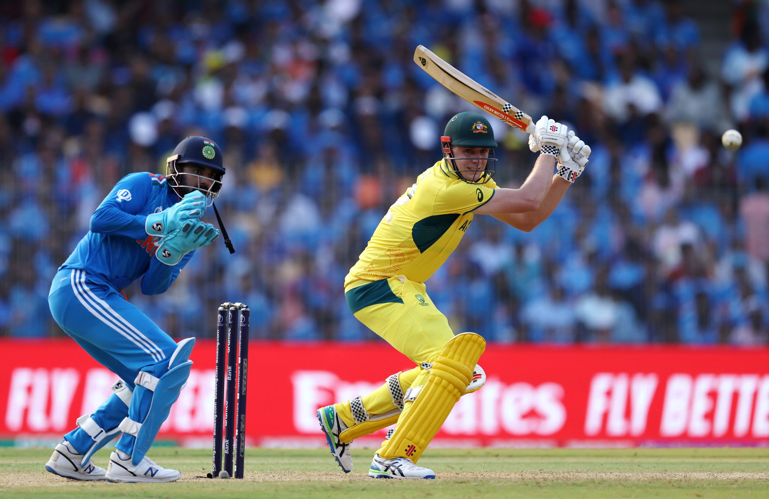 CHENNAI, INDIA - OCTOBER 08: Cameron Green of Australia hits out as he is caught by Hardik Pandya (not pictured) of India as KL Rahul of India looks on during the ICC Men's Cricket World Cup India 2023 between India and Australia at MA Chidambaram Stadium on October 08, 2023 in Chennai, India. (Photo by Matthew Lewis-ICC/ICC via Getty Images)