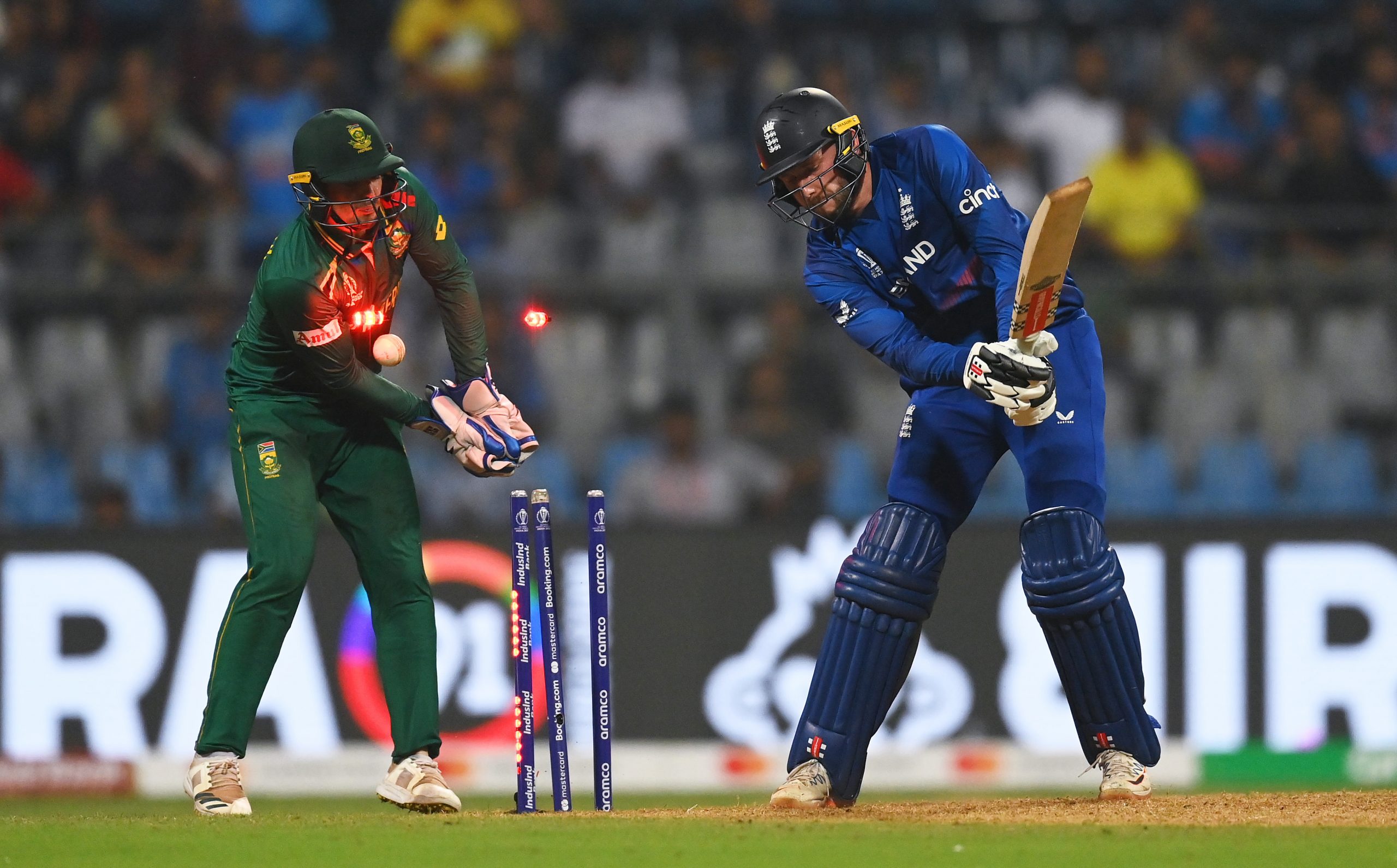 Gus Atkinson of England is bowled for 35 by Keshav Maharaj of South Africa (not pictured) during the ICC Men's Cricket World Cup India 2023 match between England and South Africa at Wankhede Stadium on October 21, 2023 in Mumbai, India. (Photo by Gareth Copley/Getty Images)