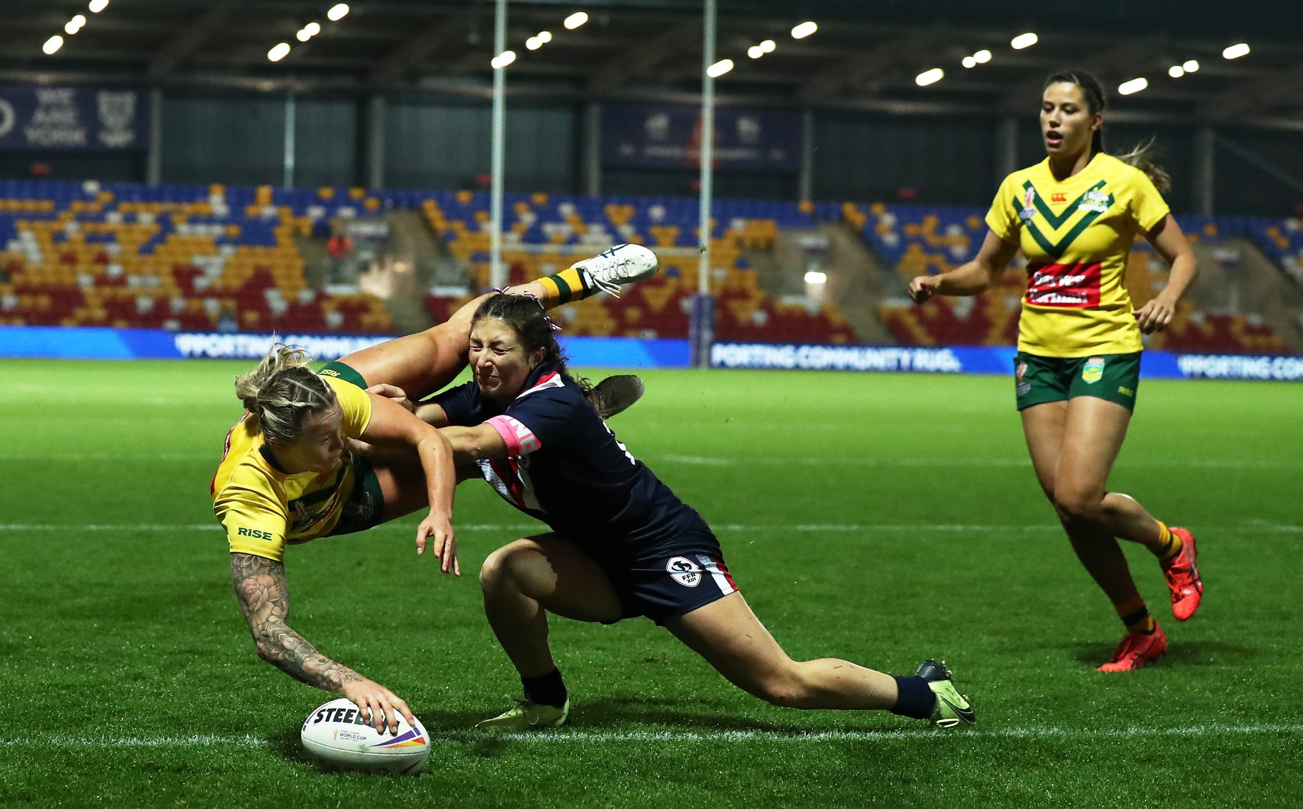 Julia Robinson goes over to score the Jillaroos' hat trick try against the Kiwi ferns.