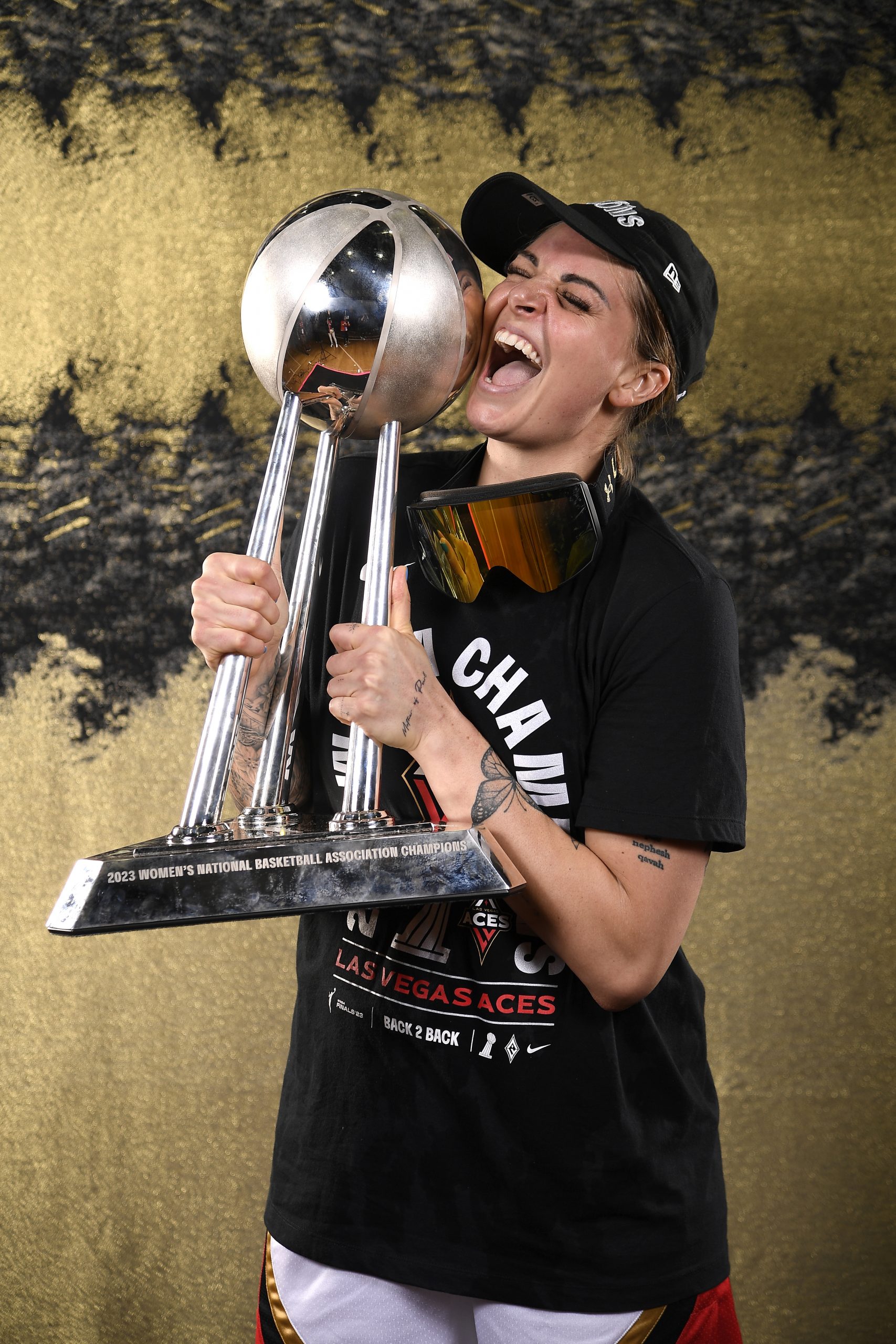 Cayla George #13 of the Las Vegas Aces poses for a portrait after winning the WNBA Final during Game 4 of the 2023 WNBA Finals on October 18, 2023 at Barclays Center in Brooklyn, New York. Photo by Brian Babineau/NBAE via Getty Images
