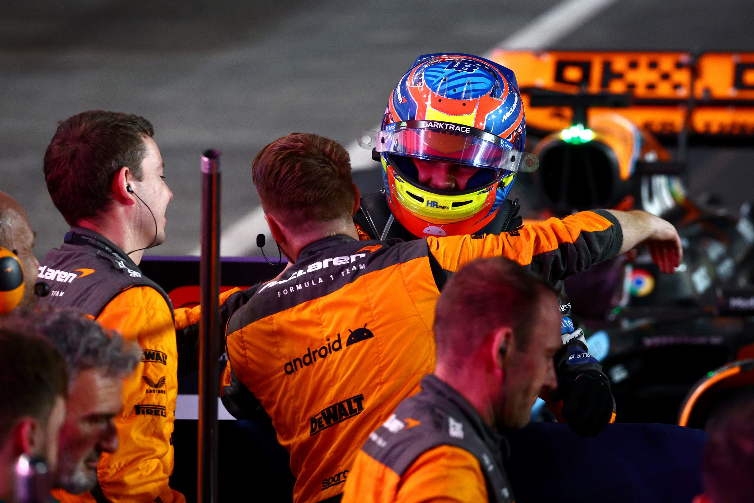 Sprint winner Oscar Piastri of Australia and McLaren celebrates with his team in parc ferme during the Sprint ahead of the F1 Grand Prix of Qatar at Lusail International Circuit on October 07, 2023 in Lusail City, Qatar. (Photo by Clive Rose/Getty Images)