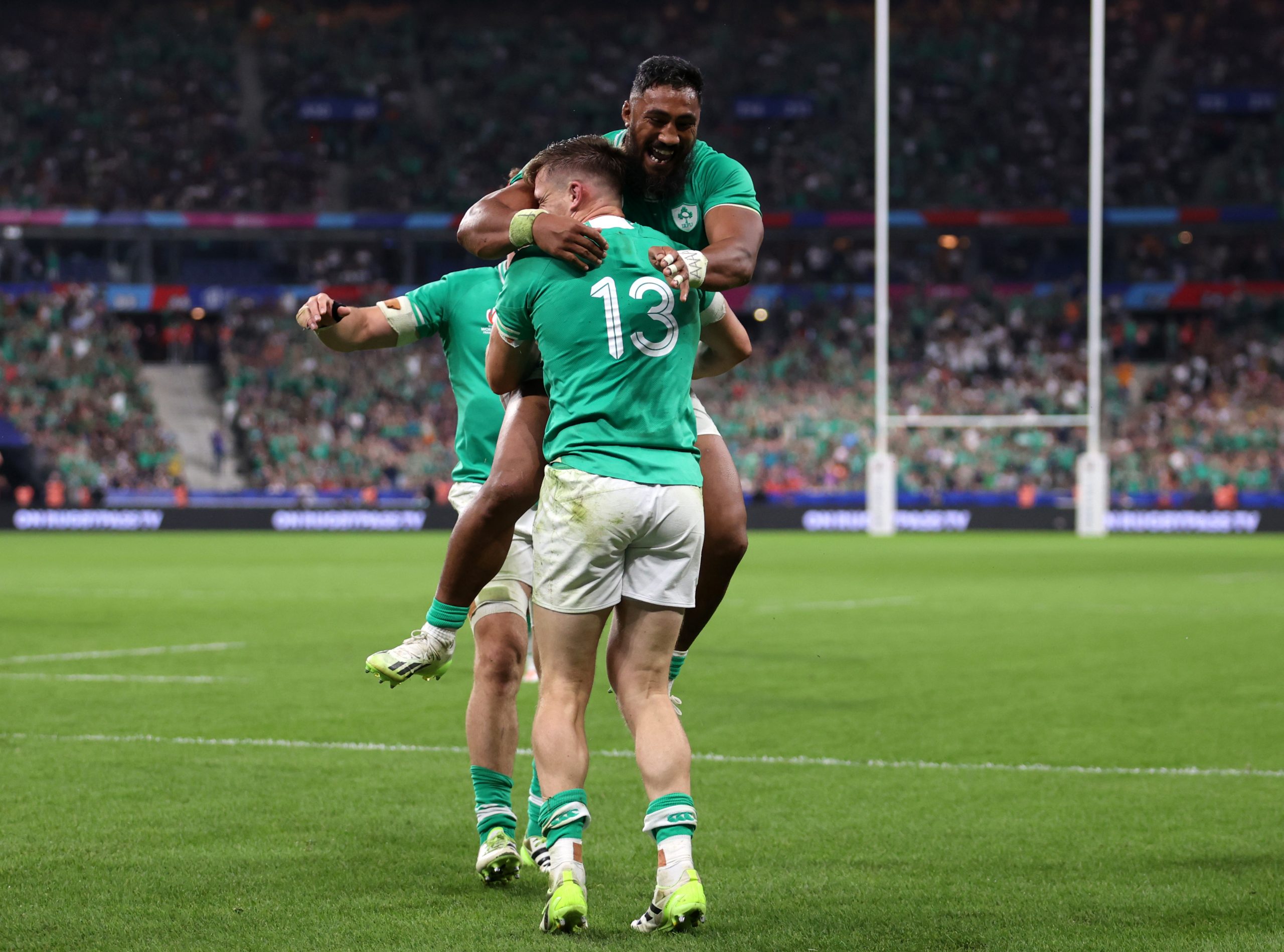 Garry Ringrose of Ireland celebrates with teammate Bundee Aki.