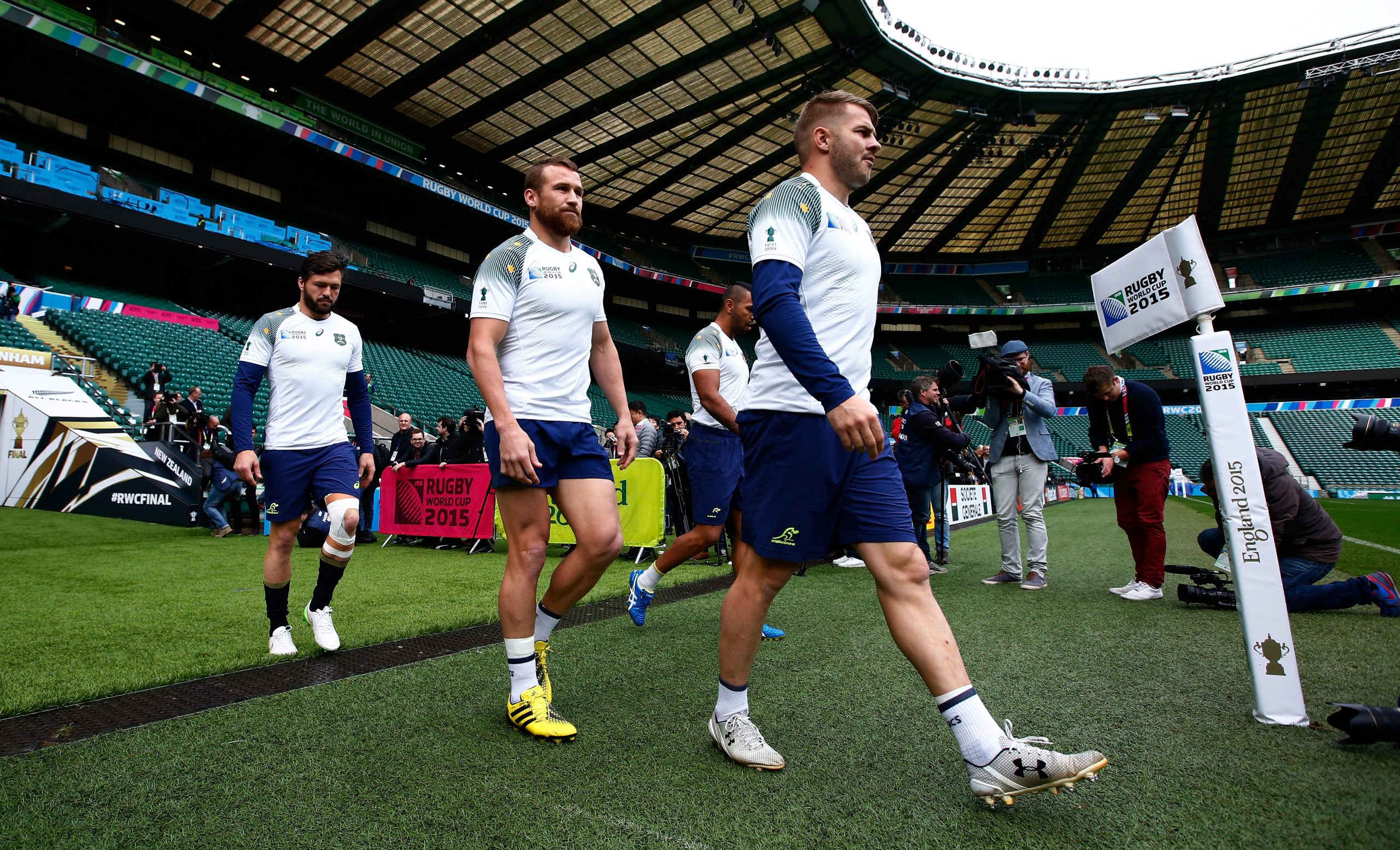 Adam Ashely-Cooper (from left), Matt Giteau, and Drew Mitchell during the Australia captain's run ahead of the 2015 Rugby World Cup Final against New Zealand at Twickenham Stadium.