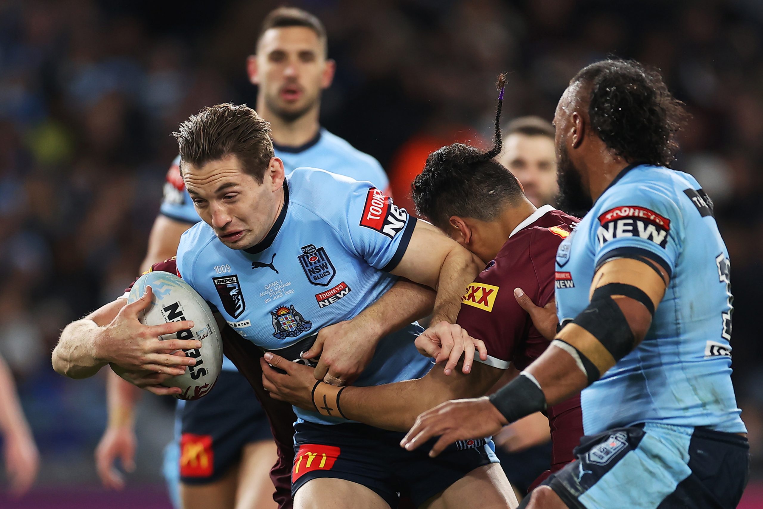 Cameron Murray trucks the ball up the field for NSW.