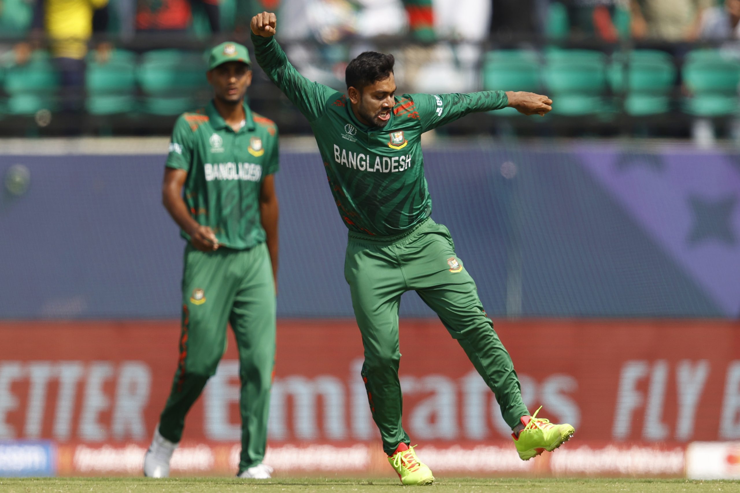 Mehidy Hasan Miraz of Bangladesh celebrates after taking the wicket of Mujeeb Ur Rahman.