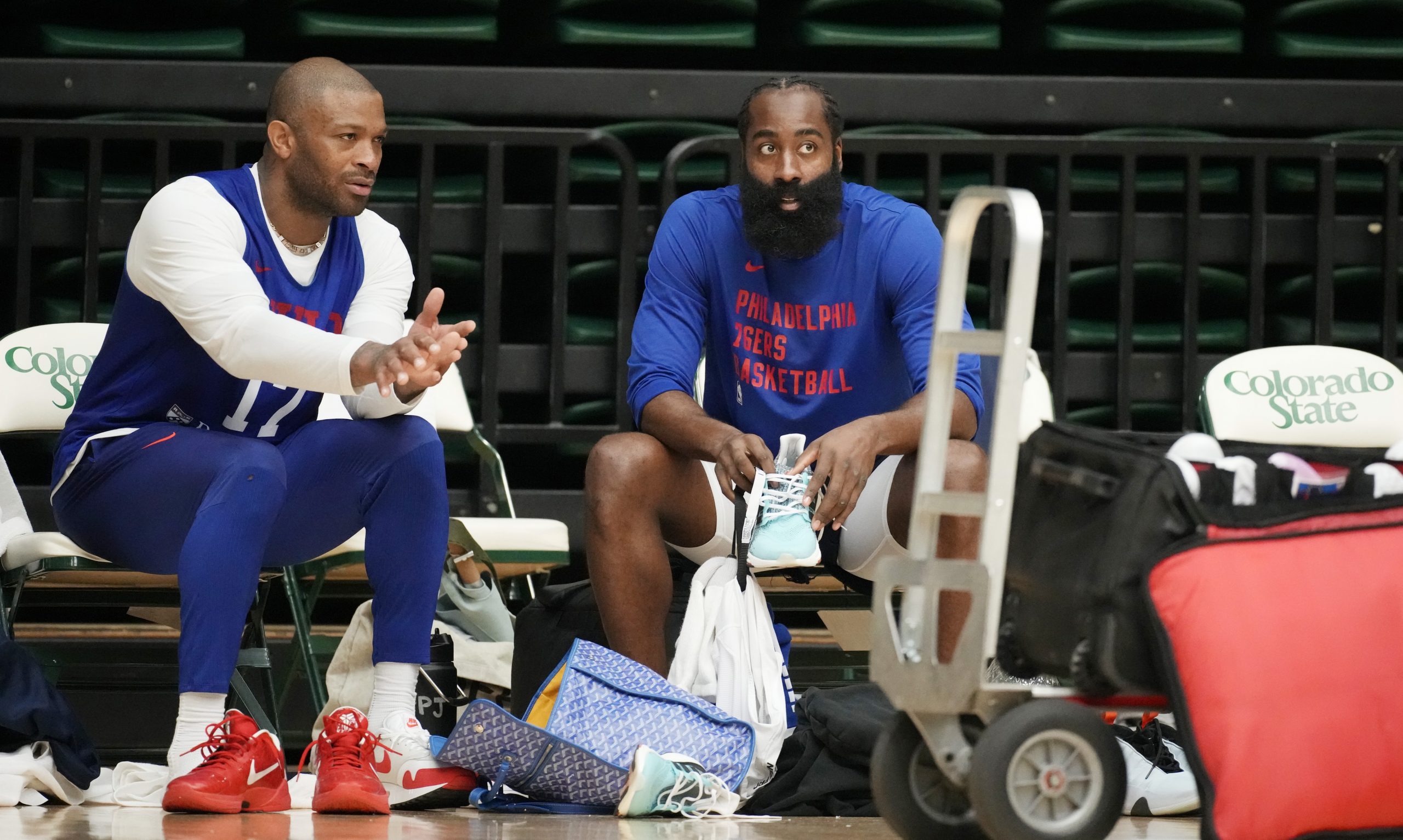 Philadelphia 76ers forward P.J. Tucker, left, chats with guard James Harden during the NBA basketball team's practice on Thursday, Oct. 5, 2023, in Fort Collins, Colo. (AP Photo/David Zalubowski)