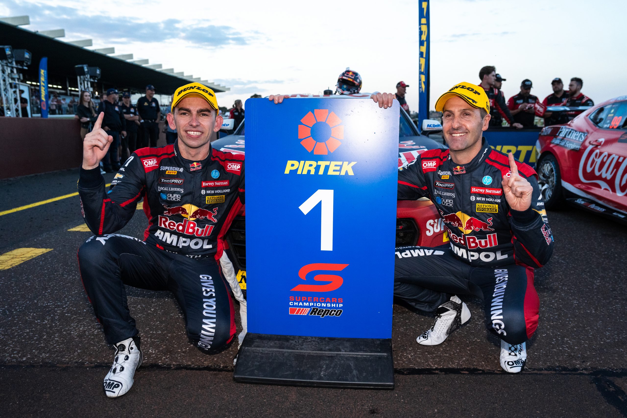 Jamie Whincup driver of the #88 Red Bull Ampol Racing Chevrolet Camaro ZL1 and Broc Feeney driver of the #88 Red Bull Ampol Racing Chevrolet Camaro ZL1 celebrate after winning the Penrite Oil Sandown 500, part of the 2023 Supercars Championship Series at Sandown Raceway on September 17, 2023 in Melbourne, Australia. (Photo by Daniel Kalisz/Getty Images)