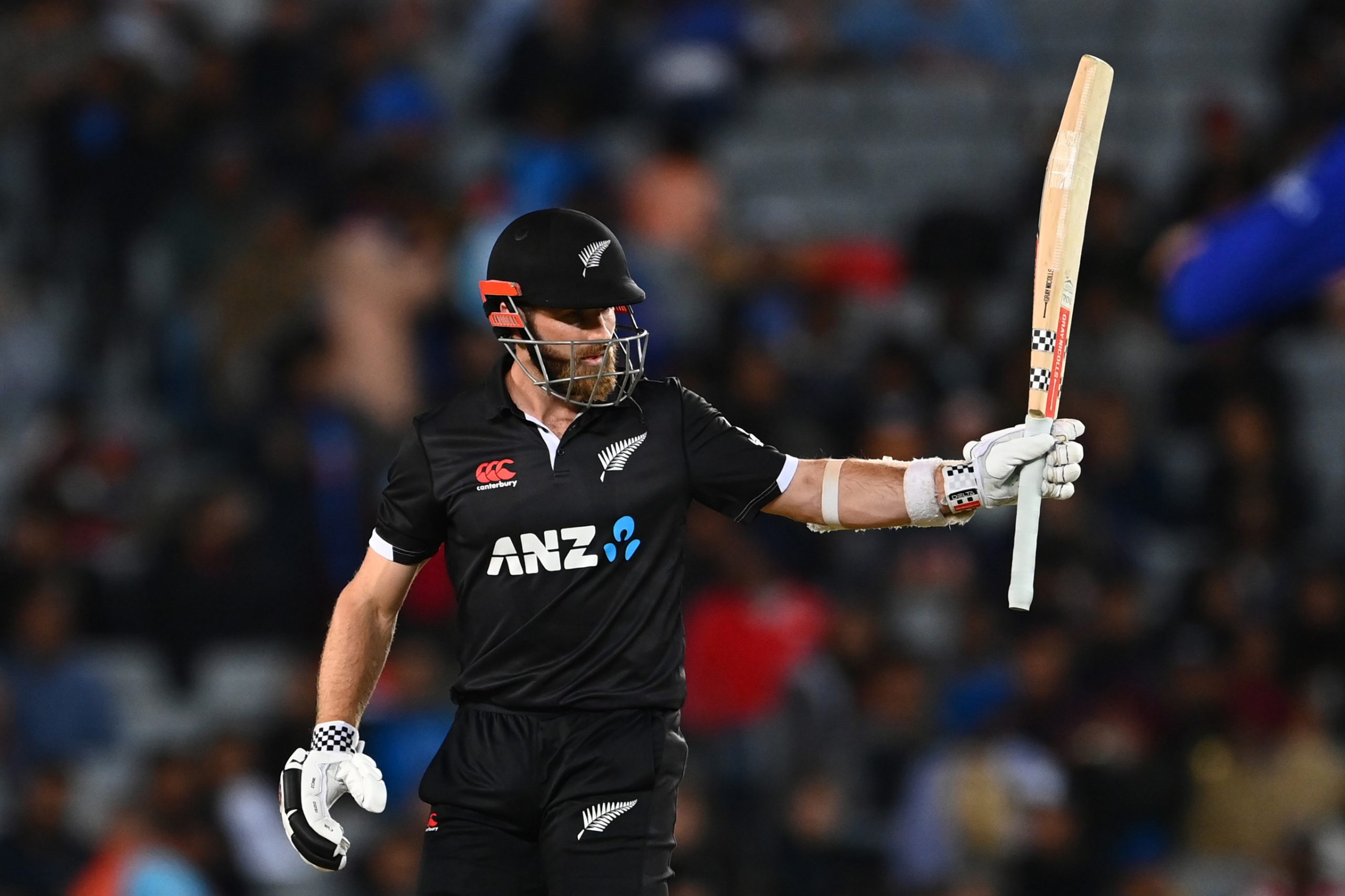 AUCKLAND, NEW ZEALAND - NOVEMBER 25: Kane Williamson of the Black Caps acknowledges the crowd after scoring fifty runs during game one of the One Day International series between New Zealand and India at Eden Park on November 25, 2022 in Auckland, New Zealand. (Photo by Hannah Peters/Getty Images)