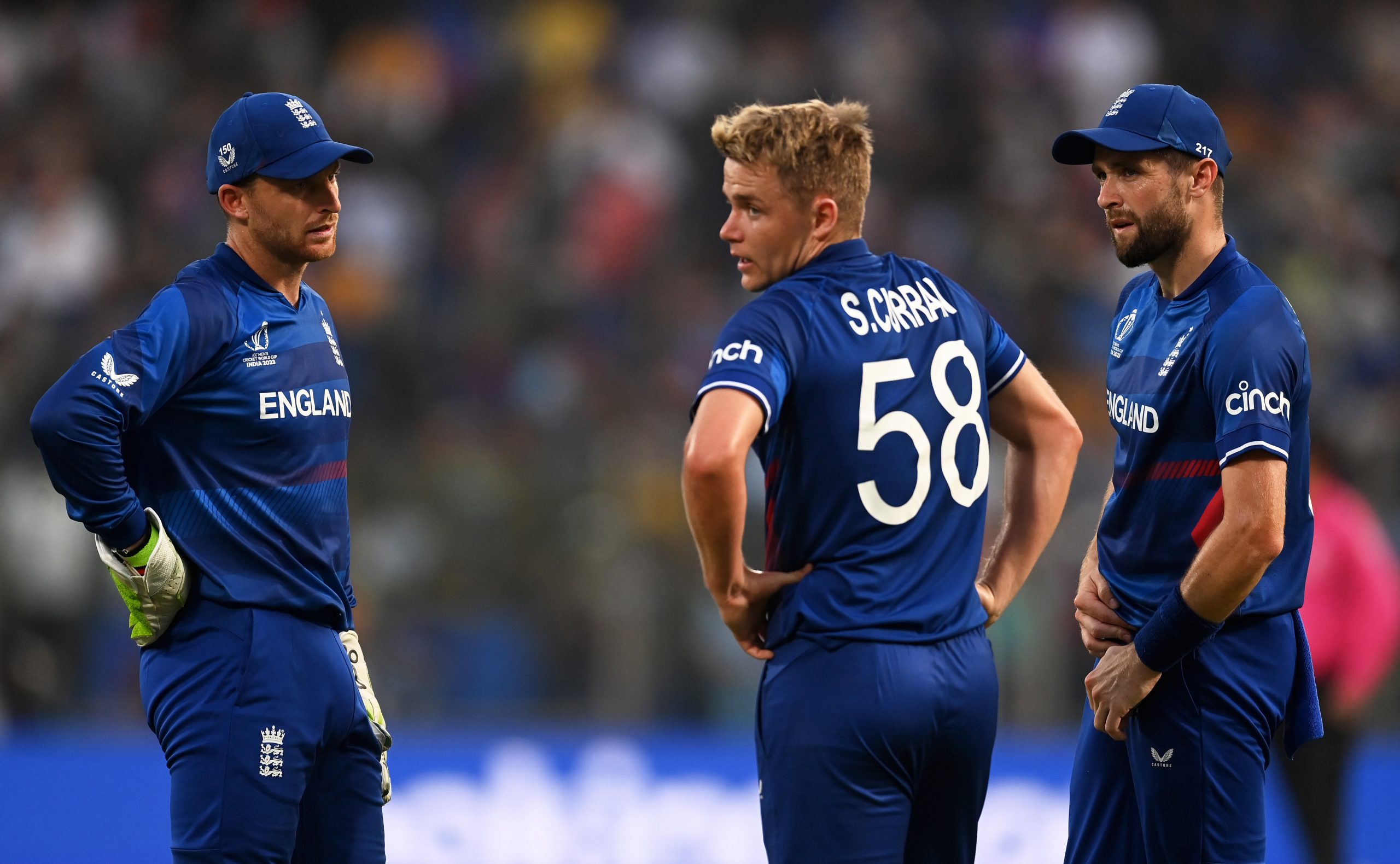 Jos Buttler, Sam Curran and Chris Woakes of England in Delhi.
