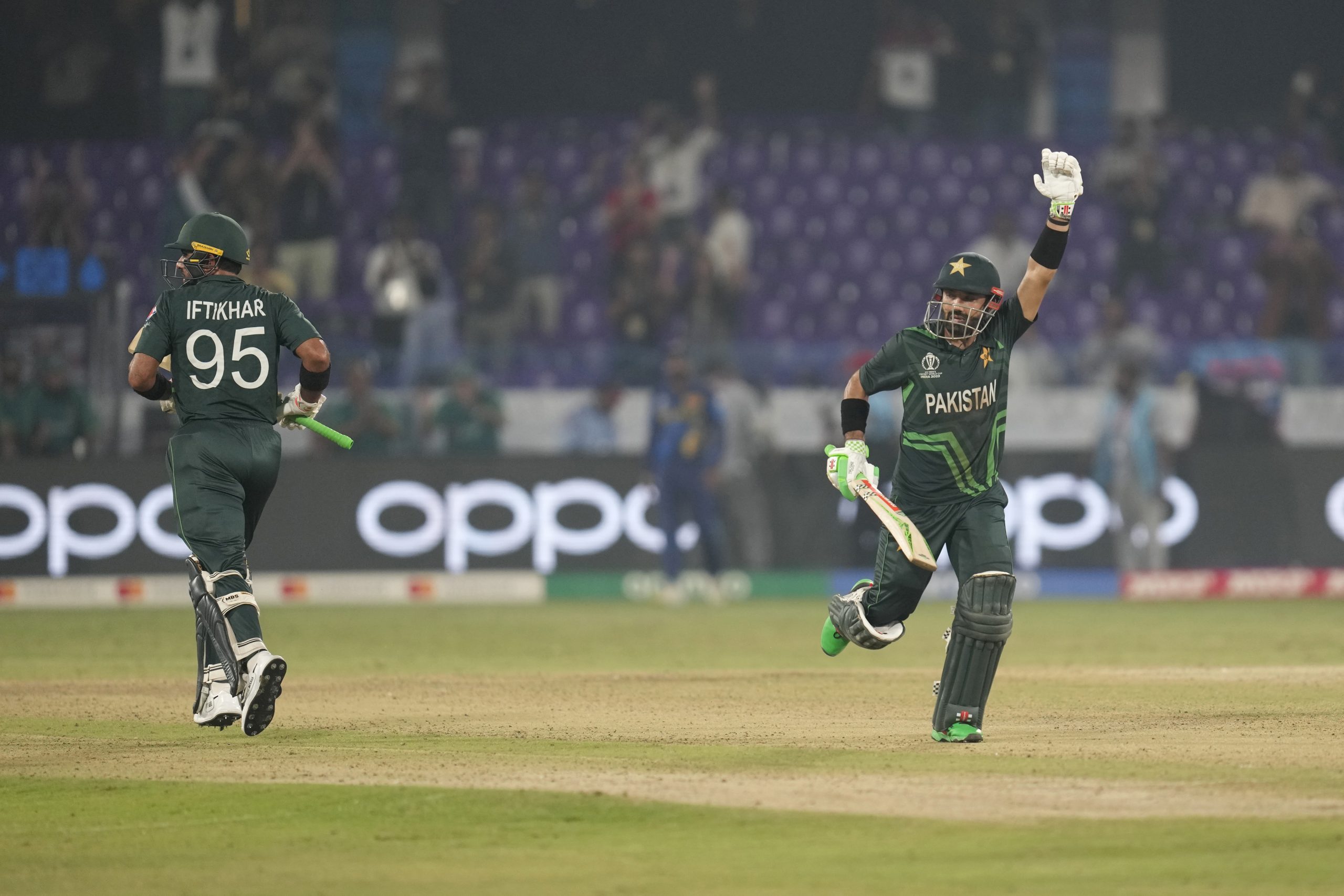 Pakistan's Mohammad Rizwan, right, and Iftikhar Ahmed celebrate their win.