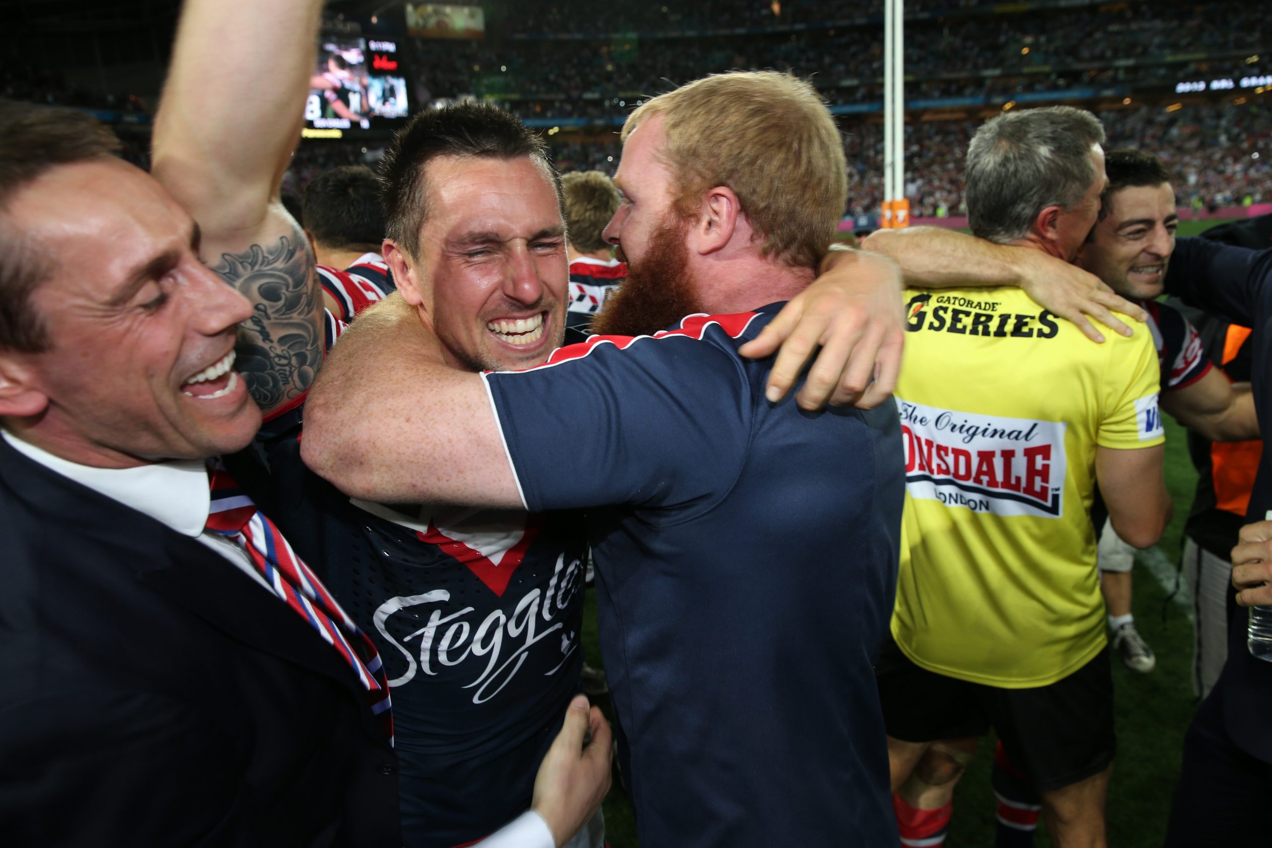 Mitchell Pearce celebrates winning the 2013 NRL grand final.