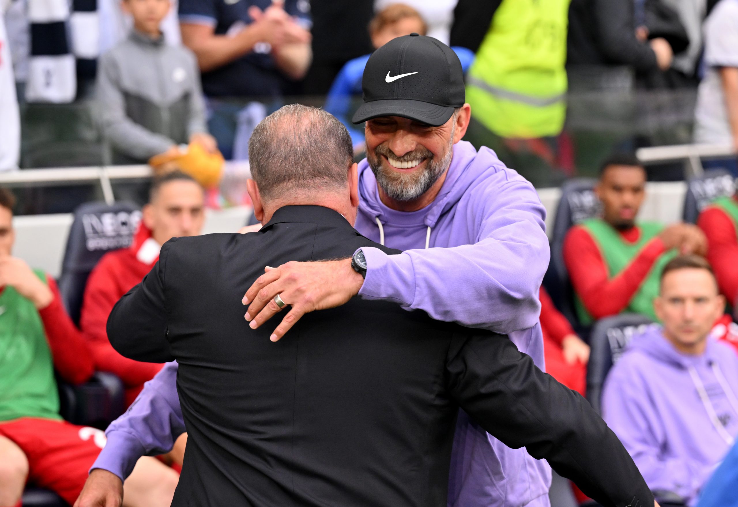 Jurgen Klopp manager of Liverpool embracing Ange Postecoglou manager of Tottenham Hotspur before the Premier League match between Tottenham Hotspur and Liverpool FC at Tottenham Hotspur Stadium on September 30, 2023 in London, England. (Photo by Andrew Powell/Liverpool FC via Getty Images)